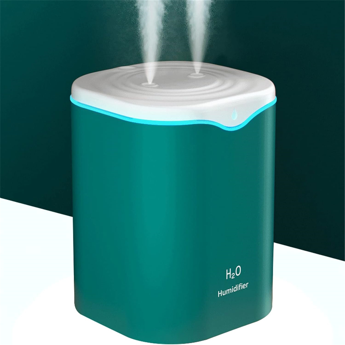 Grüner und weißer Luftbefeuchter mit zwei Dampfauslässen. Text: H2O, Luftbefeuchter.