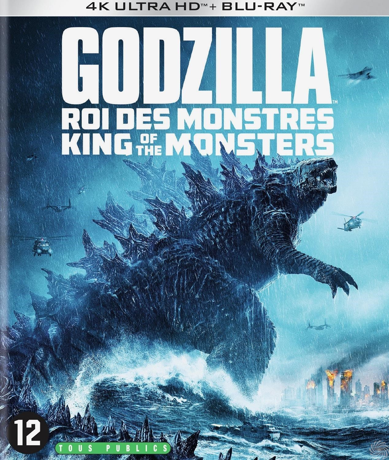 Godzilla Blu-ray cover. Godzilla komt uit het water. De cover heeft tekst en afbeeldingen.