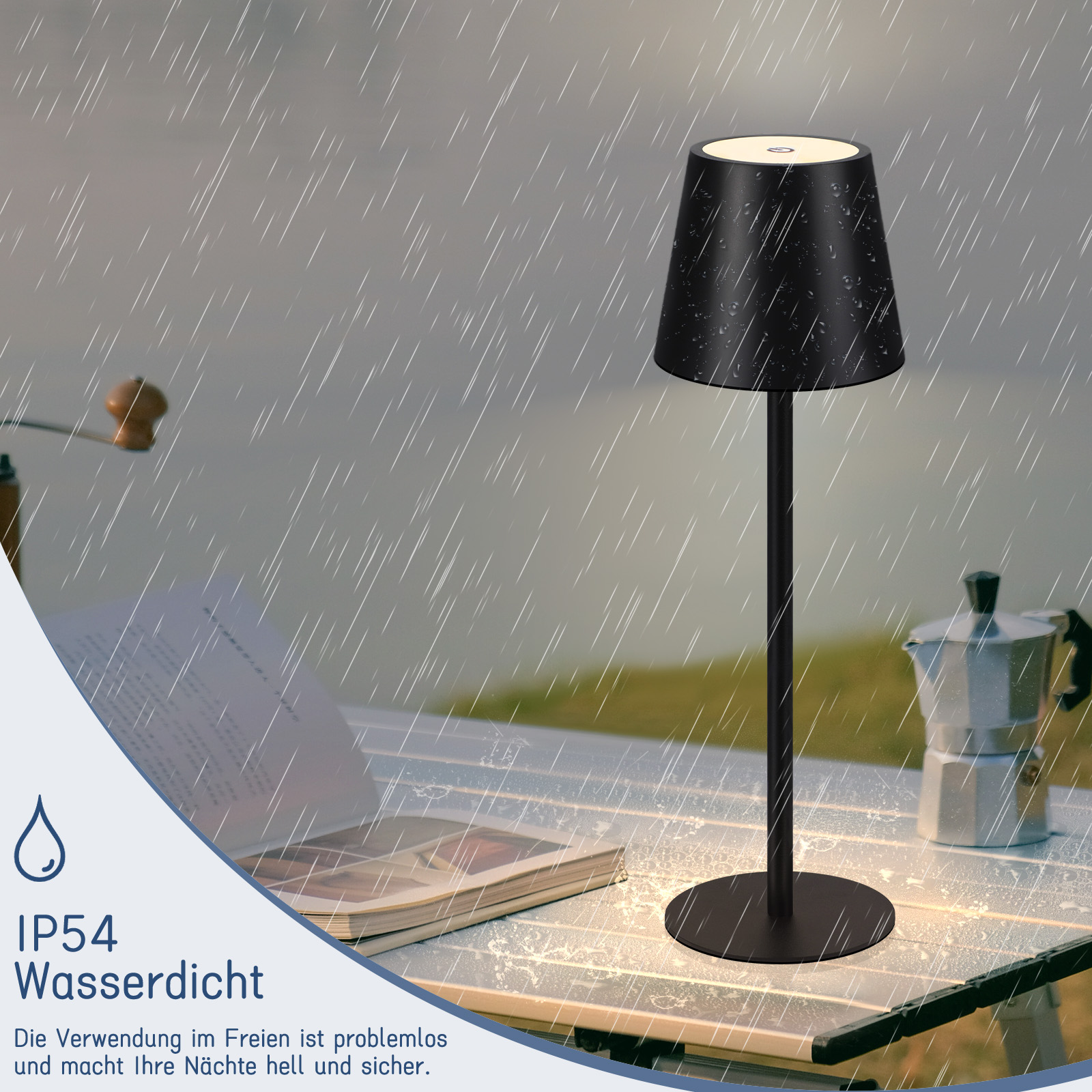 Czarna lampa zewnętrzna na stole, z padającym deszczem. Lampa na stole.