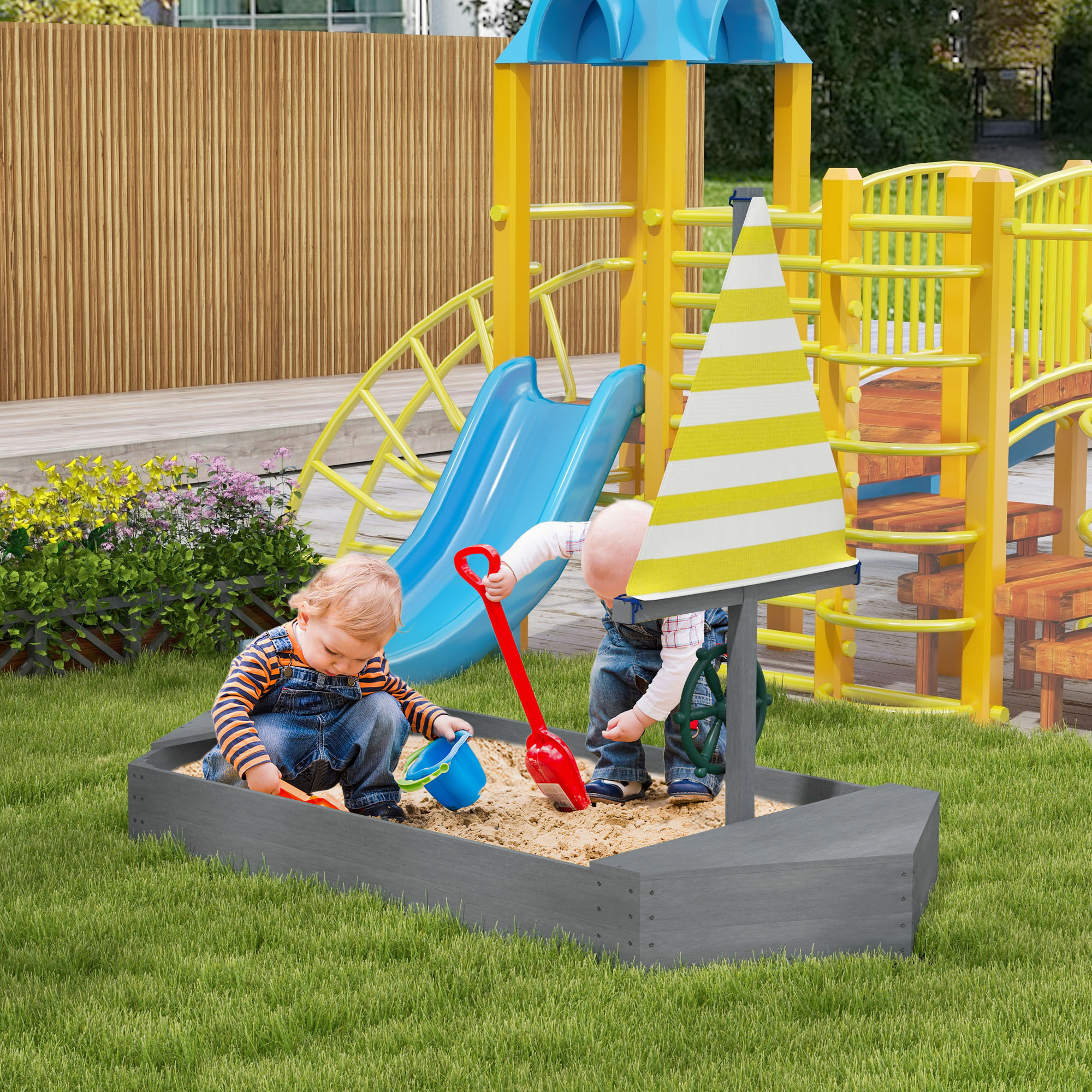 Due bambini giocano in una sabbiera con dei giocattoli. Un parco giochi e uno scivolo sono visibili sullo sfondo.