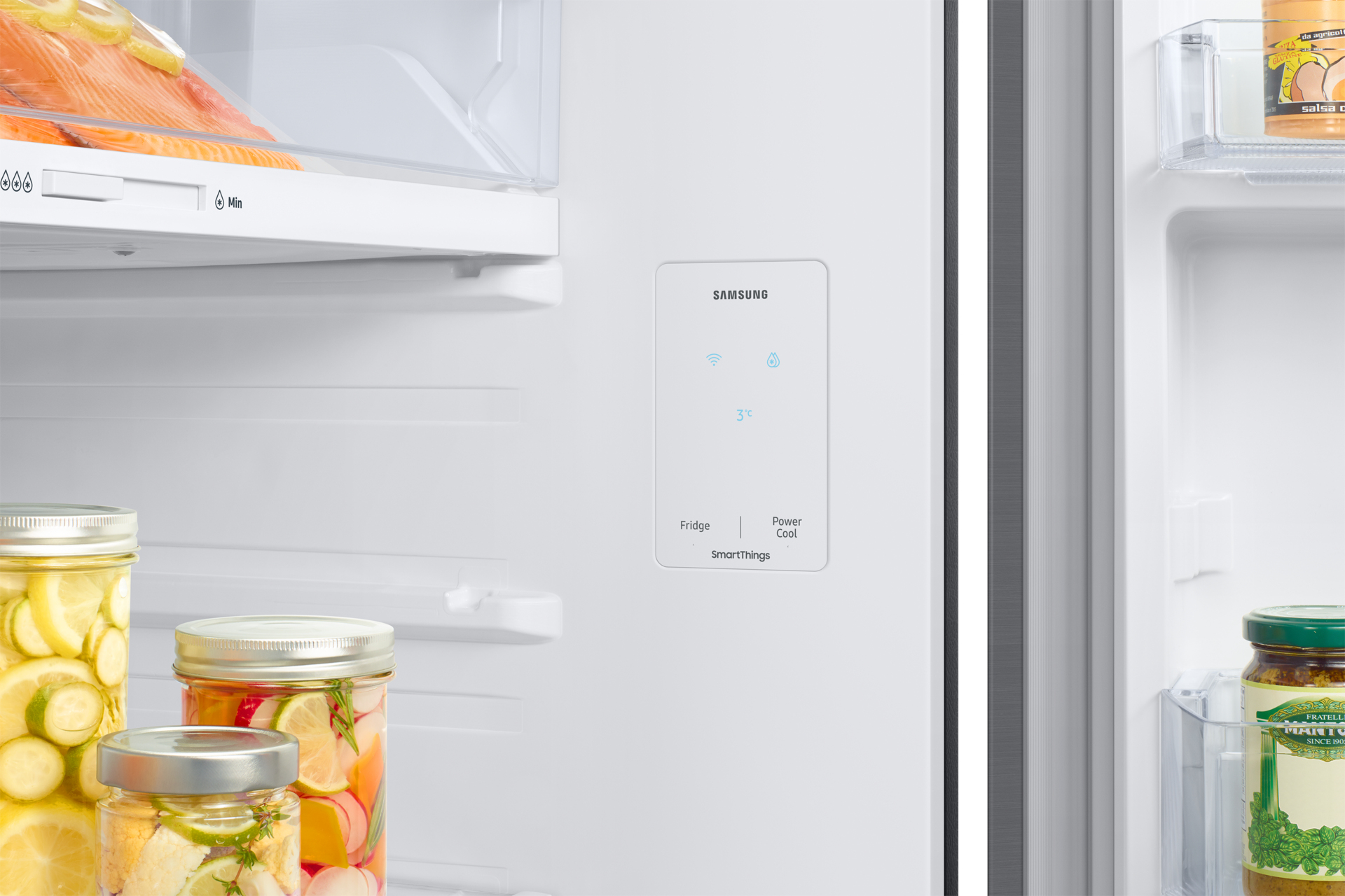 Refrigerator's interior detail with a control panel. The control panel says 'Fridge', 'Power Cool'.