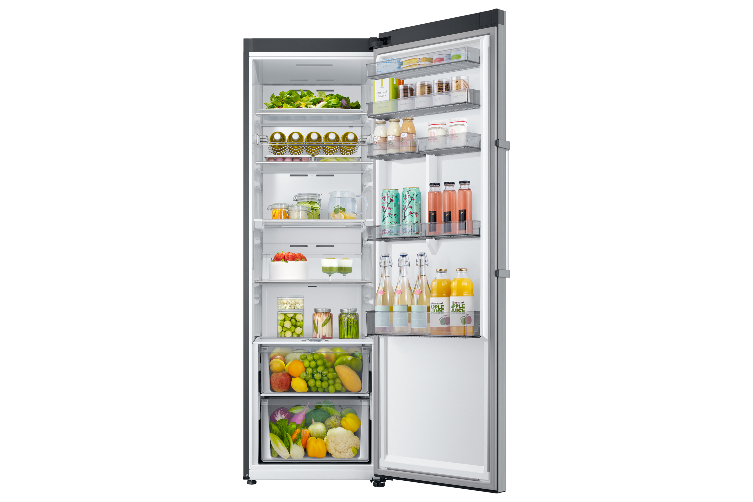 Refrigerador abierto lleno de alimentos. Hay frutas, verduras, botellas de jugo y otros artículos.