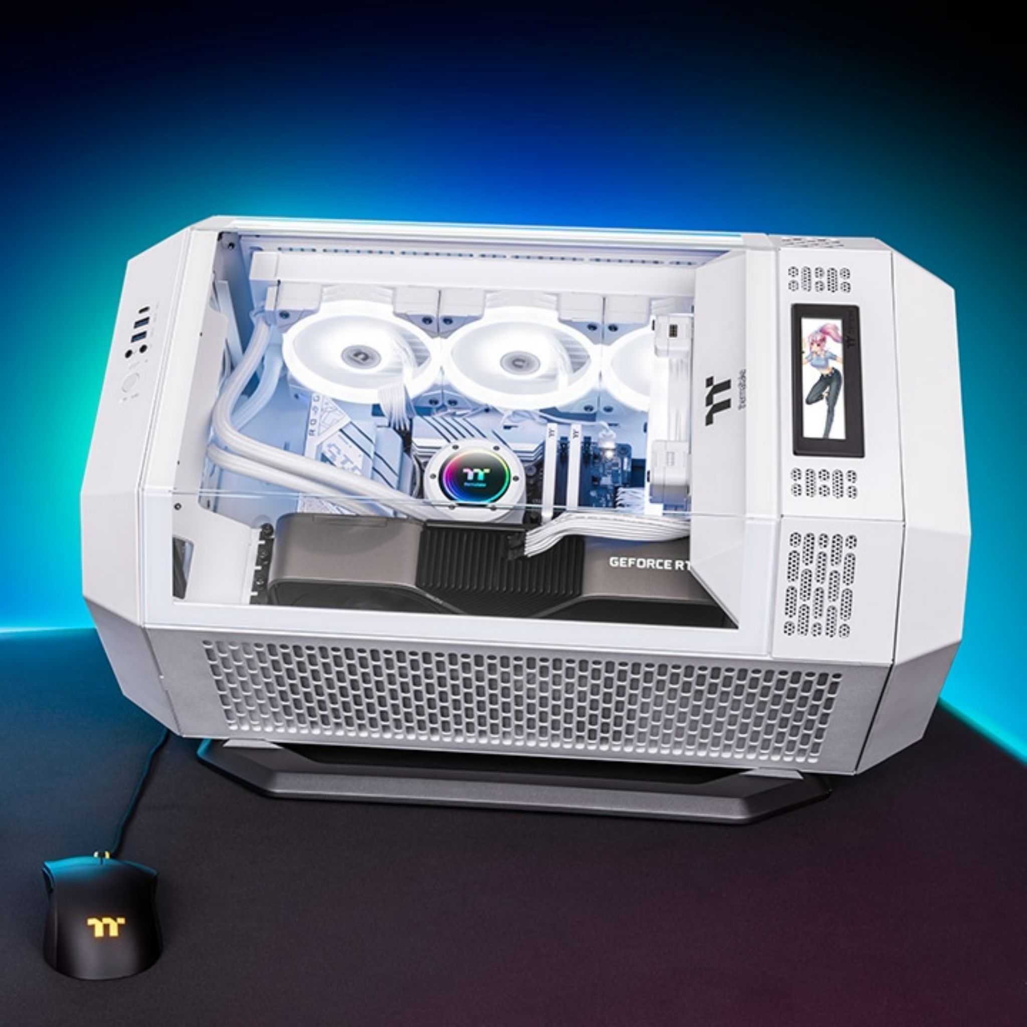 Computer case with components inside, white and black design, with a monitor.