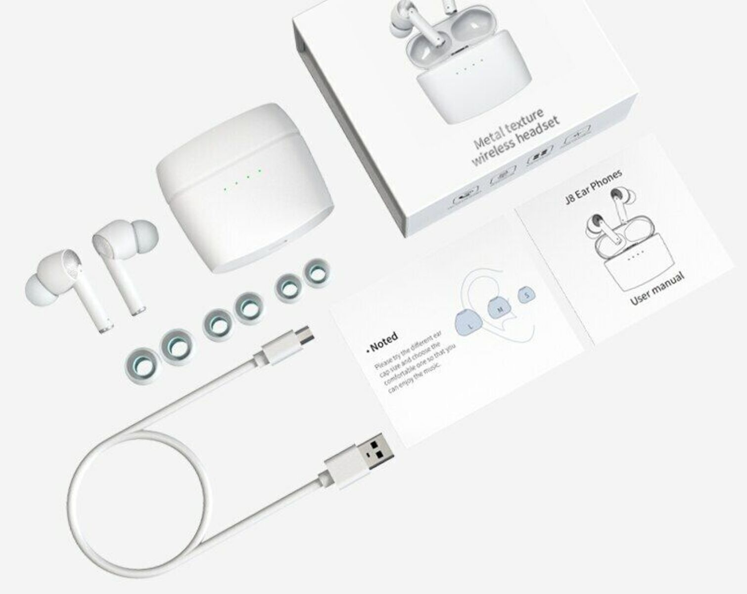 Weiße kabellose Ohrhörer, Ladeetui, zusätzliche Ohrstöpsel und ein USB-Kabel.