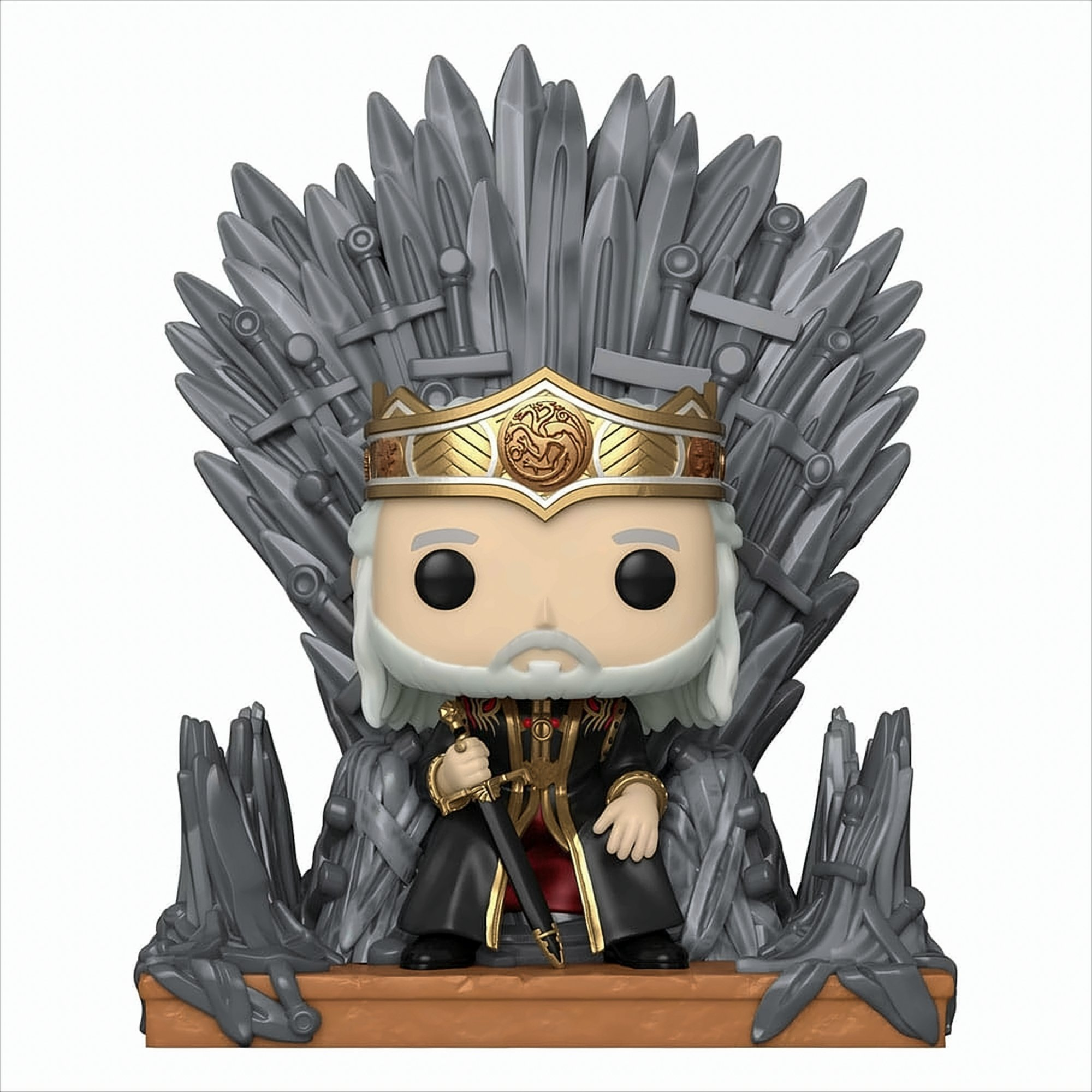 Una figura Funko Pop de un personaje de Juego de Tronos, sentado en el Trono de Hierro.