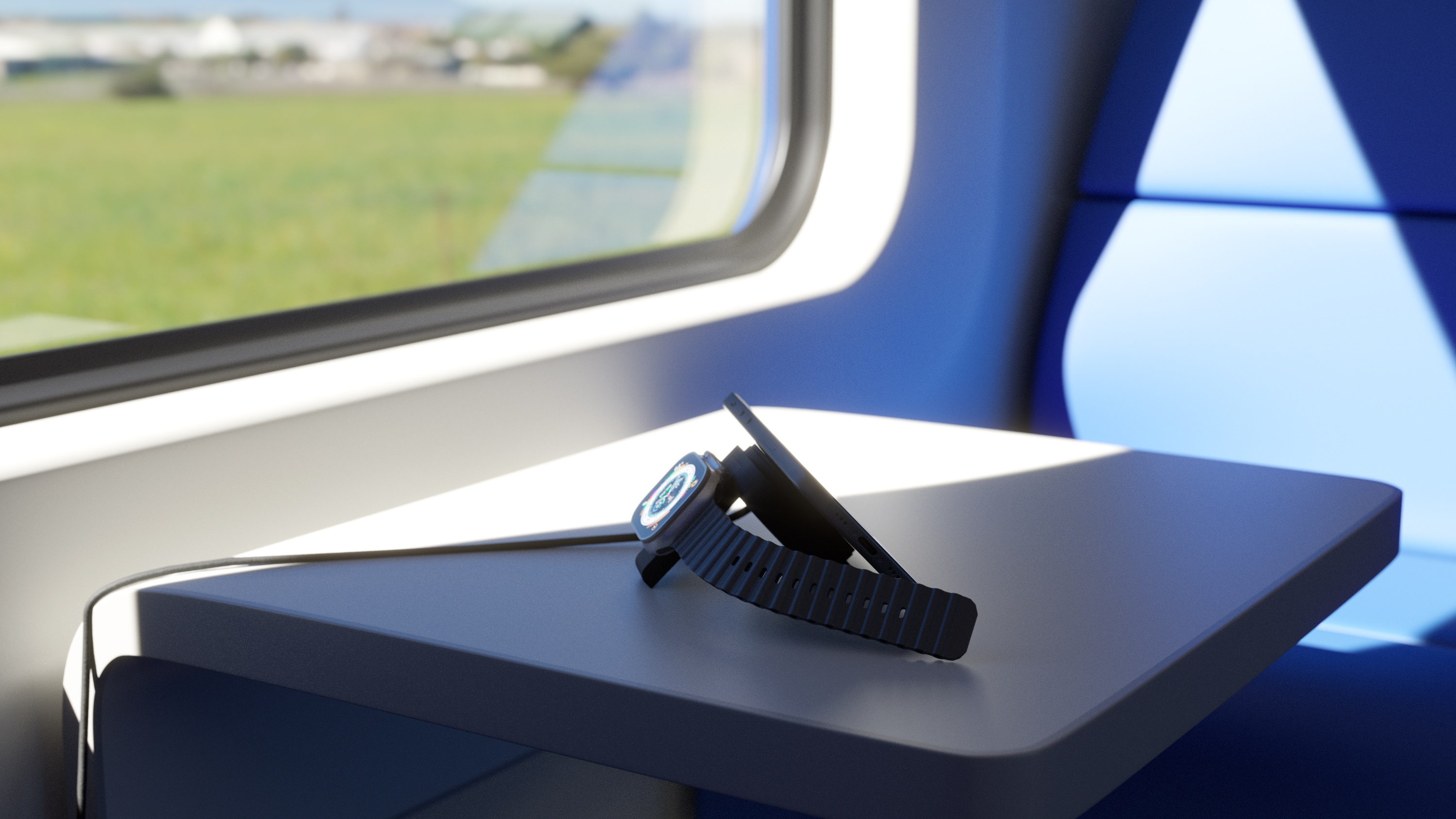 Eine Smartwatch mit schwarzem Armband auf einem Tablett im Zug.