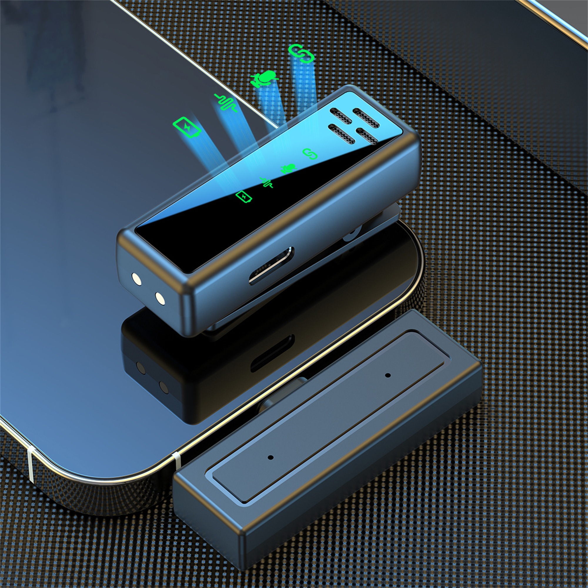 Schwarzes, elegantes Mikrofon auf einem Telefon, mit Ladestation und separatem Mikrofon. Dunkler Hintergrund.