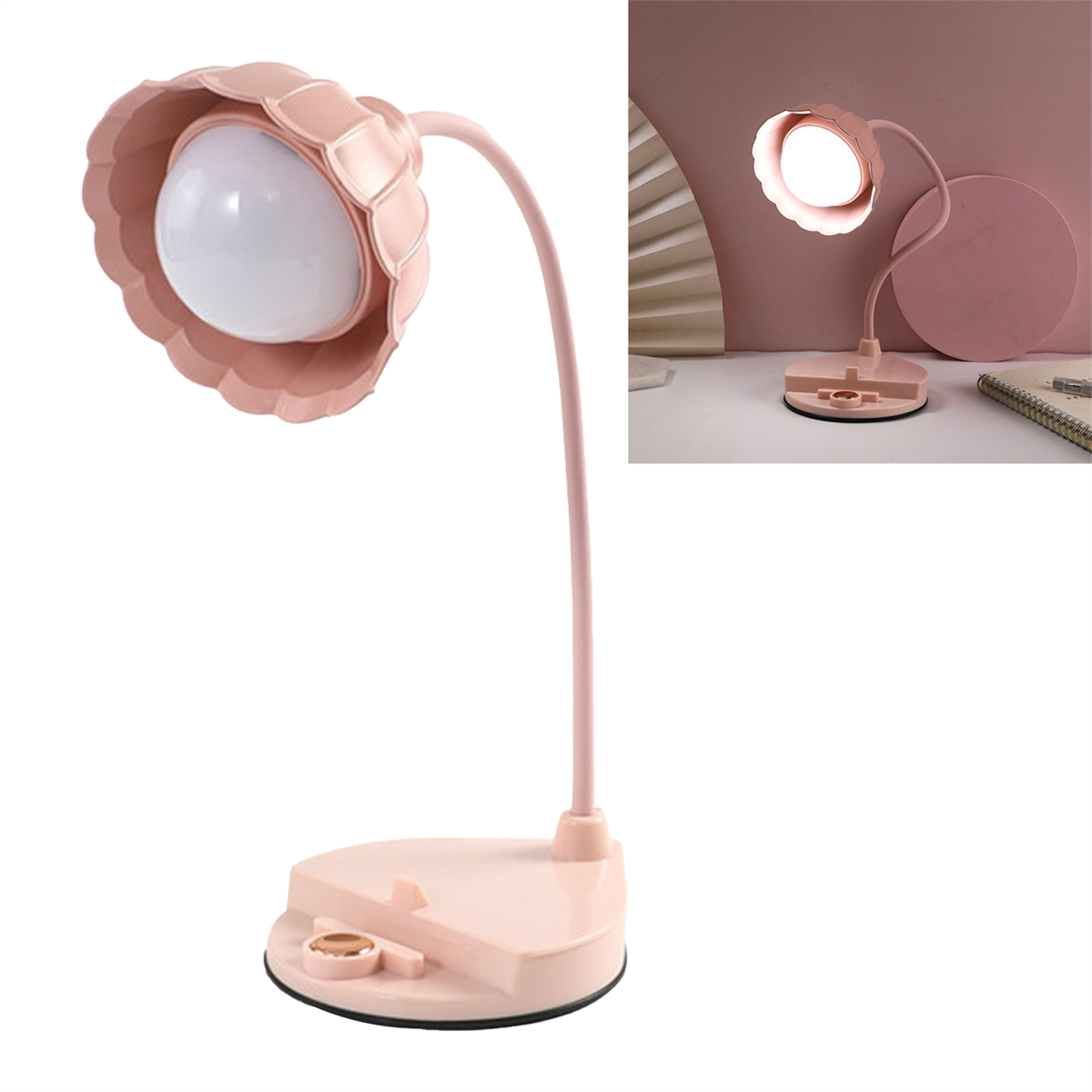 Eine rosa Schreibtischlampe mit blütenförmigem Schirm und Basis mit Telefonhalter, auf weißem Grund.