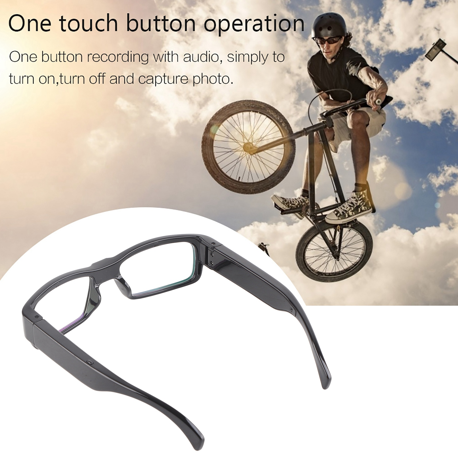 Schwarze Brille mit eingebauter Kamera, Person fährt Fahrrad im Hintergrund.