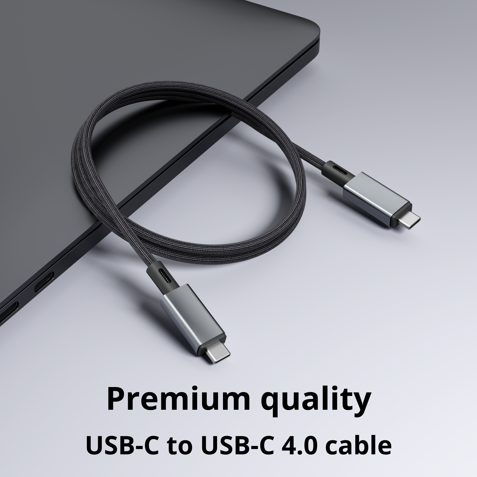 Een USB-C naar USB-C kabel, met een zwarte gevlochten kabel en zilveren uiteinden.