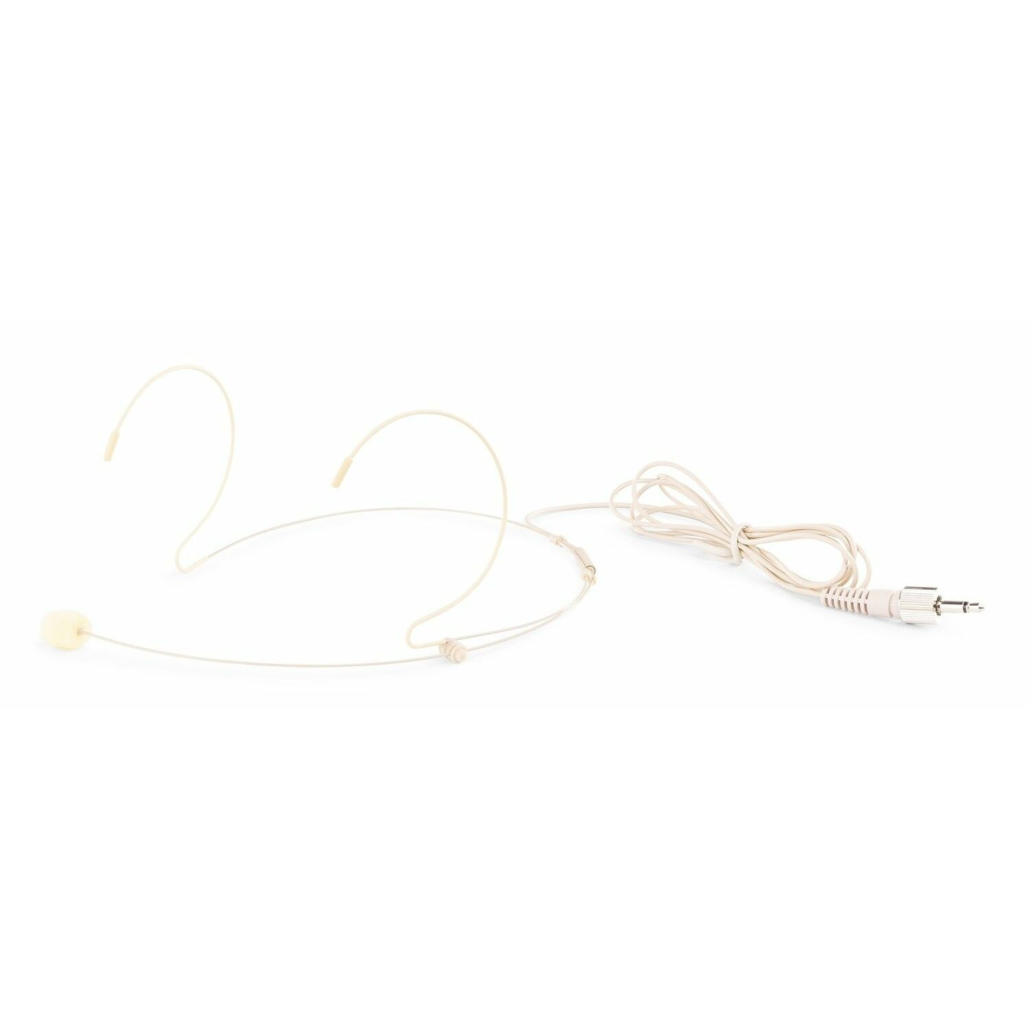 A beige headset microphone lies on a white surface. It has a microphone, a headpiece, and a cable with a jack.