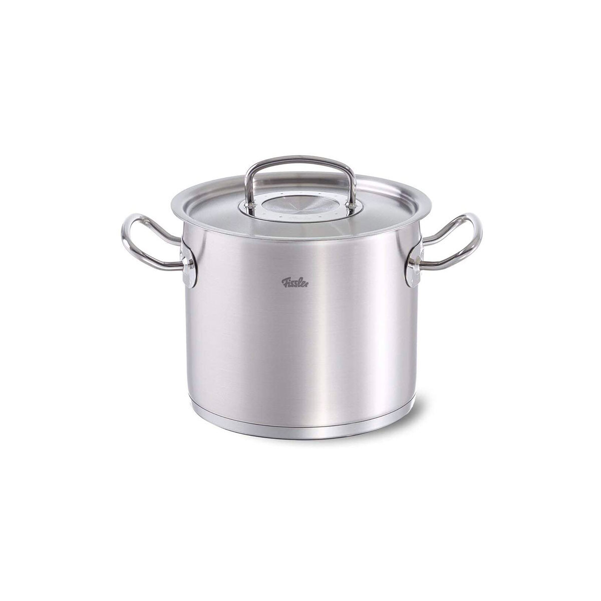 Zbliżenie metalowego dzbanka do kawy z uchwytem. Garnek ma błyszczącą, odblaskową powierzchnię.