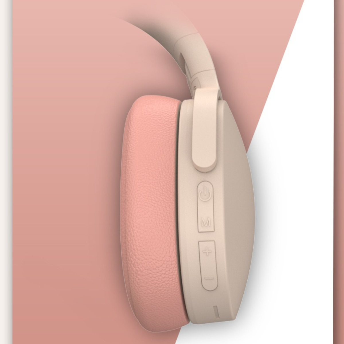 Nahaufnahme von Kopfhörern mit rosa Ohrmuscheln. Knöpfe befinden sich an der Seite.