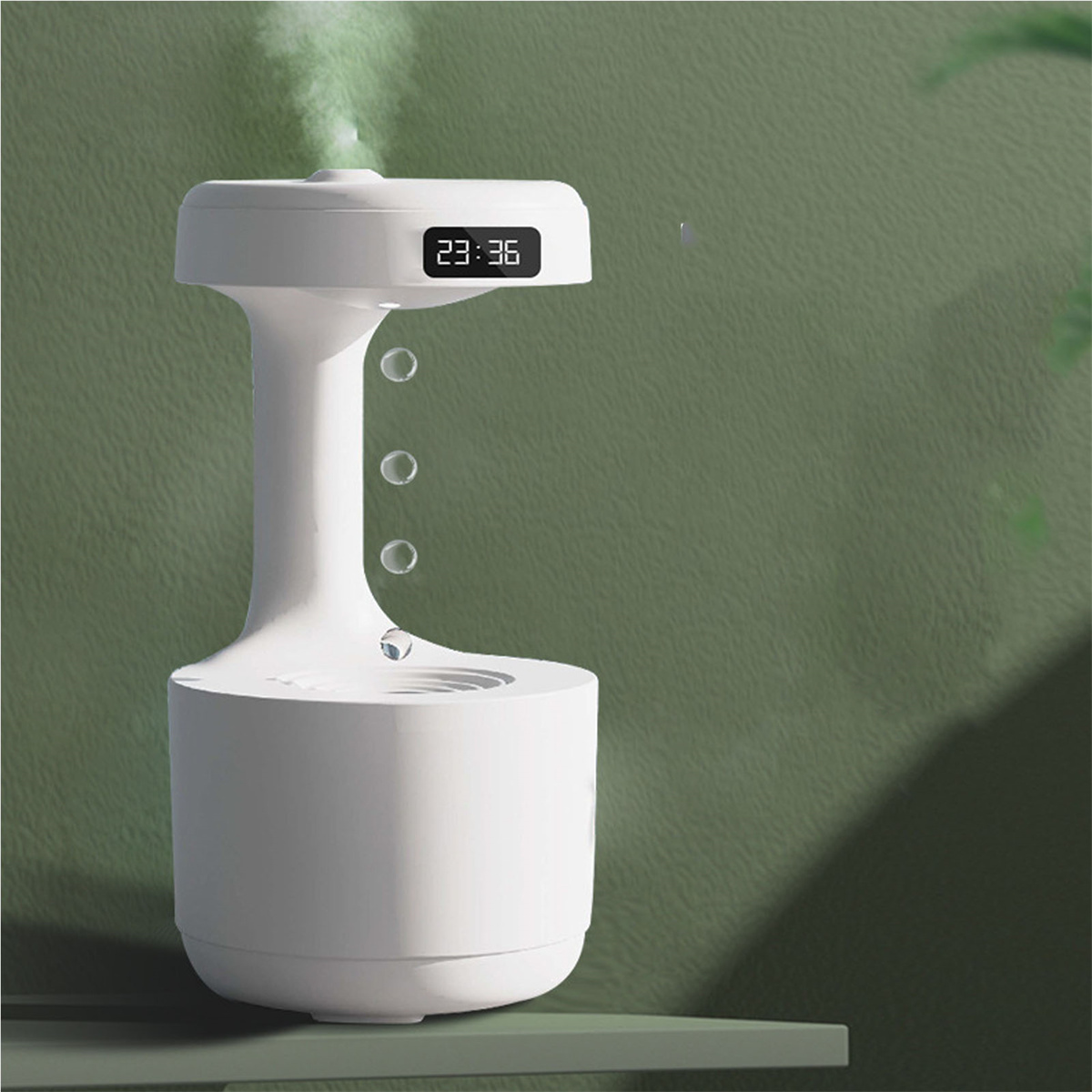 Ein weißer, futuristischer Luftbefeuchter mit Digitalanzeige und Wassertropfen.