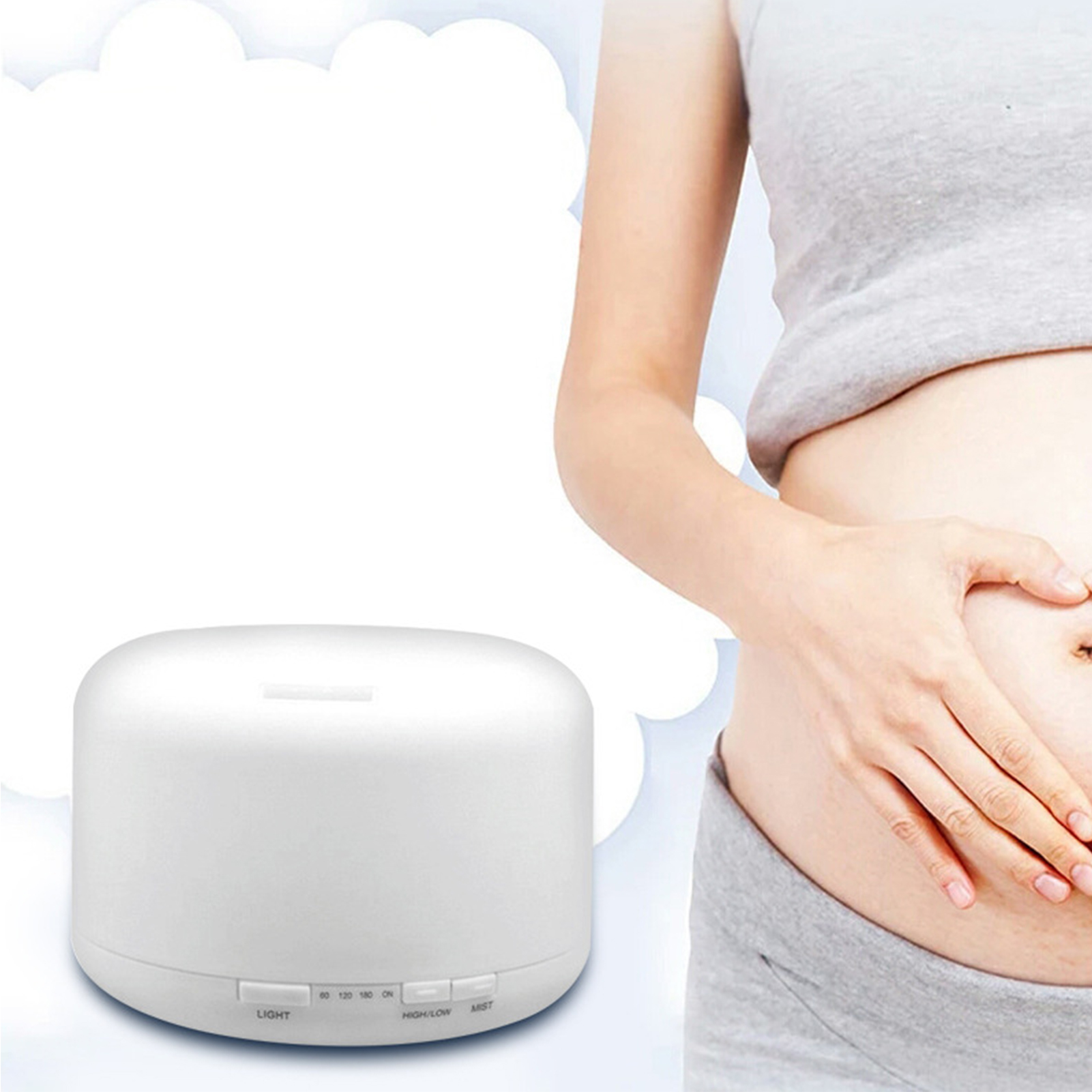 Weißer Diffusor für ätherische Öle und der Bauch einer schwangeren Frau, steht für Aromatherapie in der Schwangerschaft.