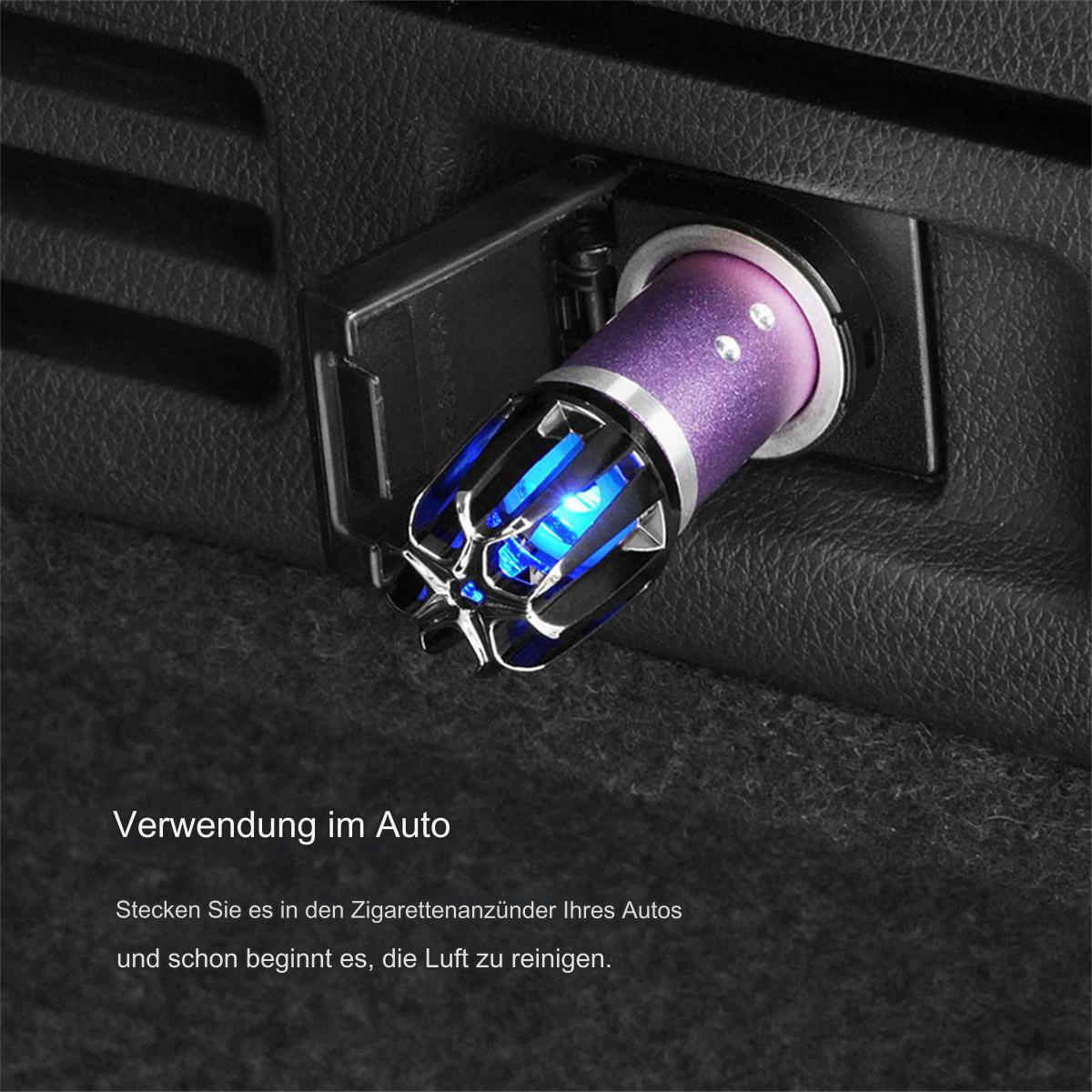 Eine schwarze Taschenlampe mit rotem Knopf und drei hellen Lichtern am Kopf.