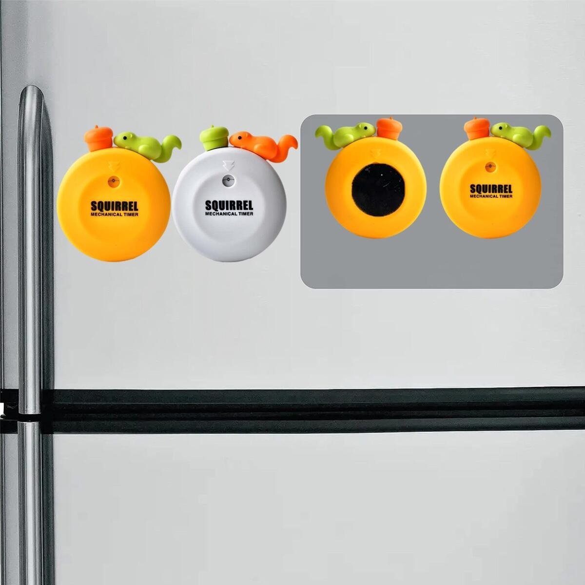 Drei gelbe Eichhörnchen-Timer mit grünen und orangen Details auf Kühlschrankoberfläche.