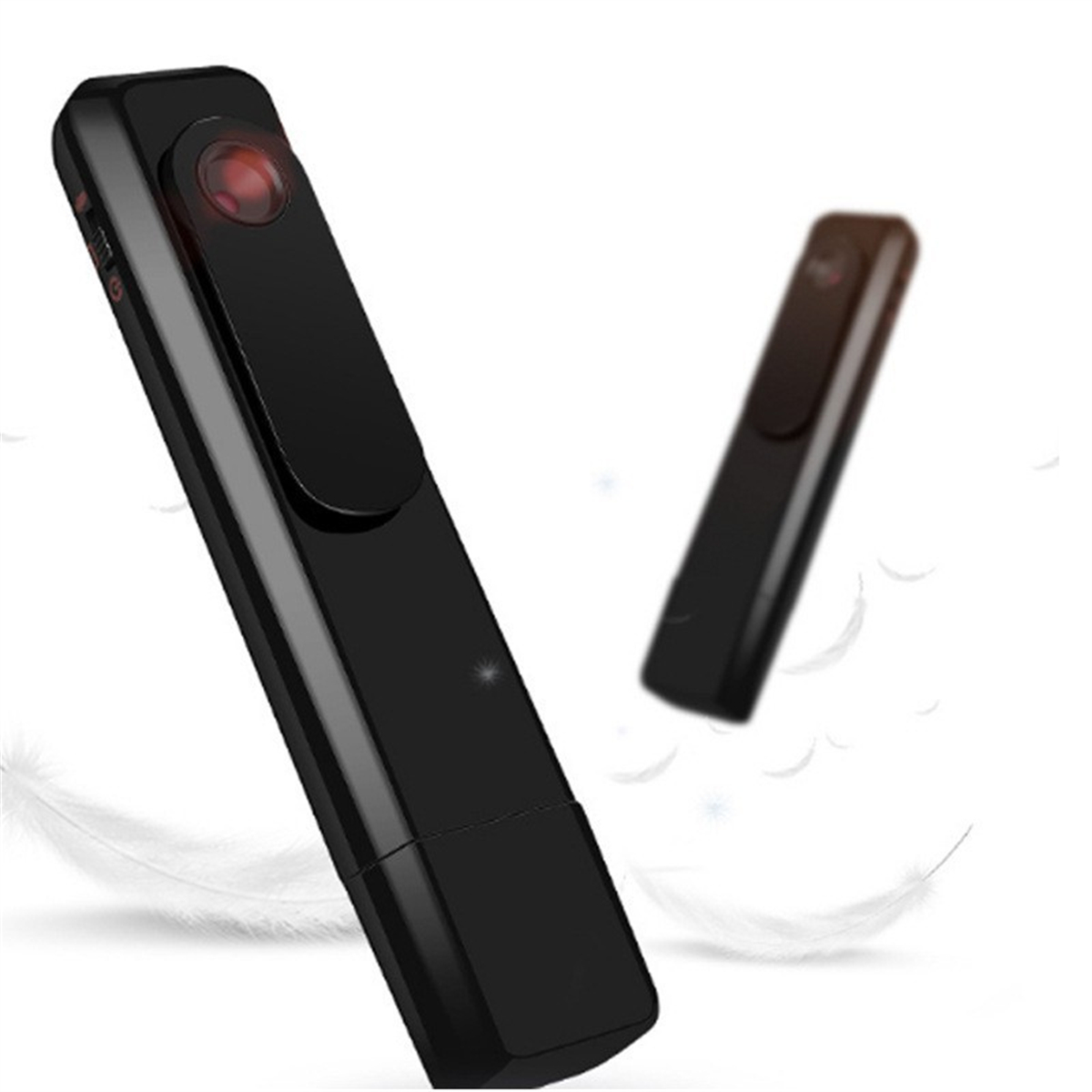 Zwei schwarze USB-Geräte, eines fokussiert, das andere unscharf, vor einem weißen Federhintergrund.