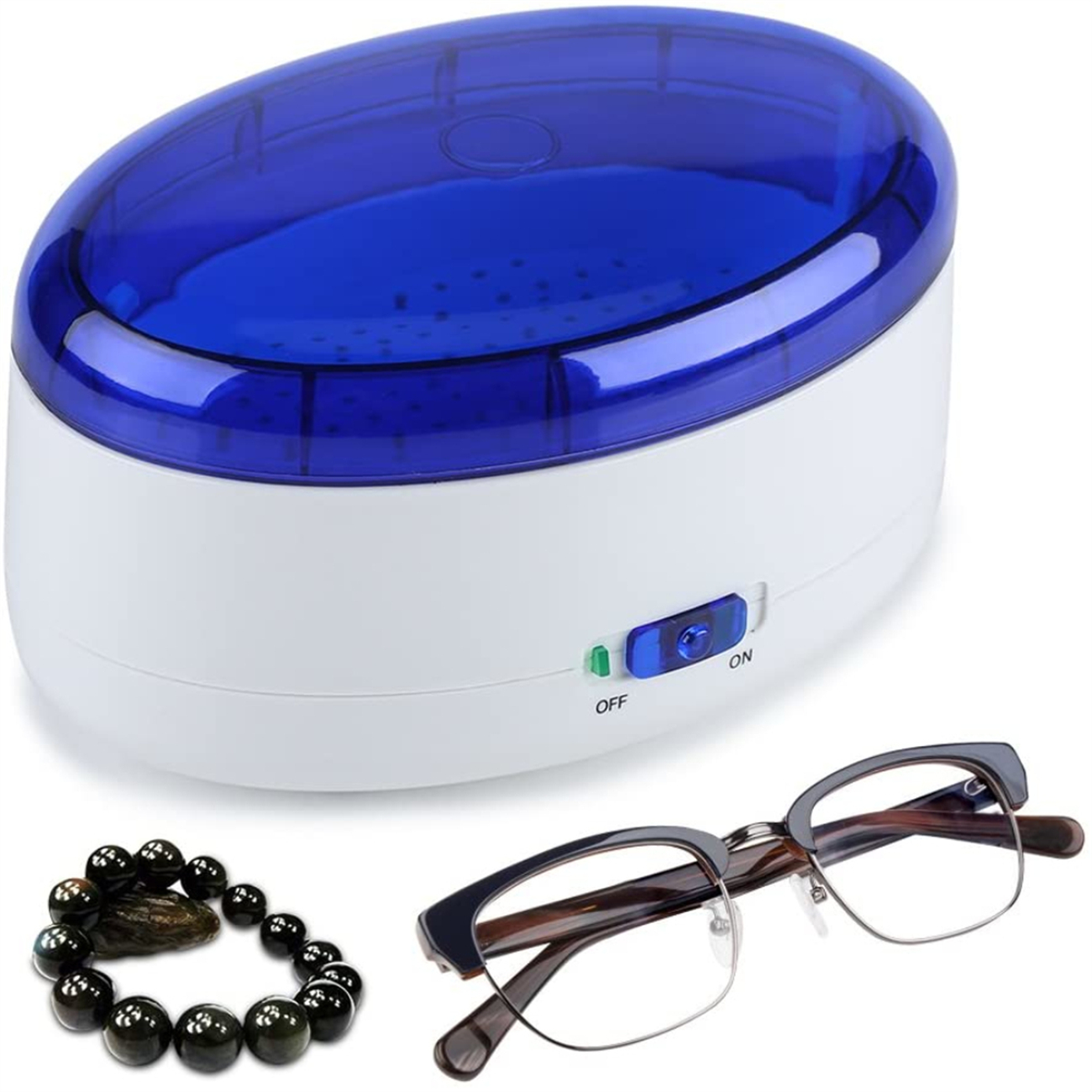 Ein Ultraschallreiniger mit Brille und Armband daneben.