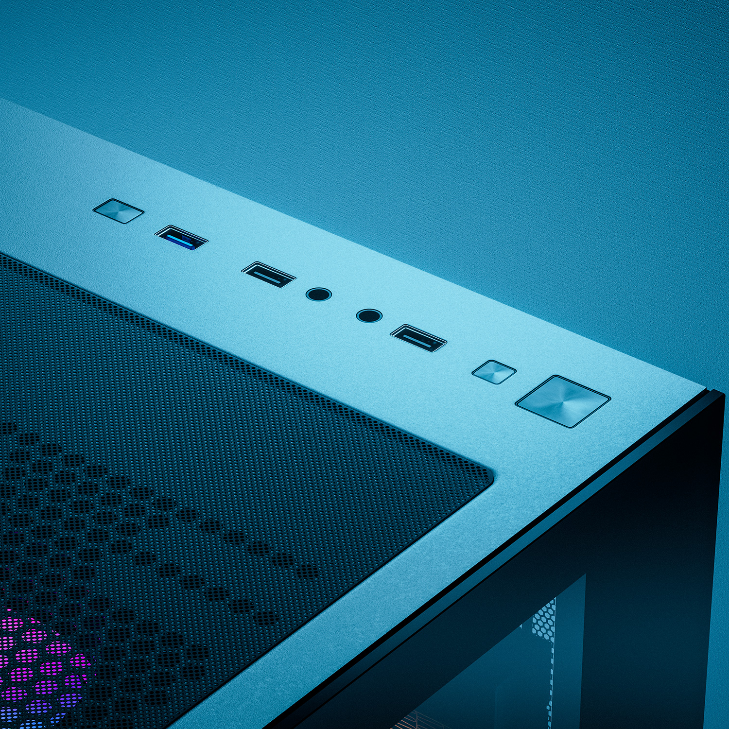 Nahaufnahme eines Computergehäuses mit Belüftung und USB-Anschlüssen. Blaue Beleuchtung vorhanden.