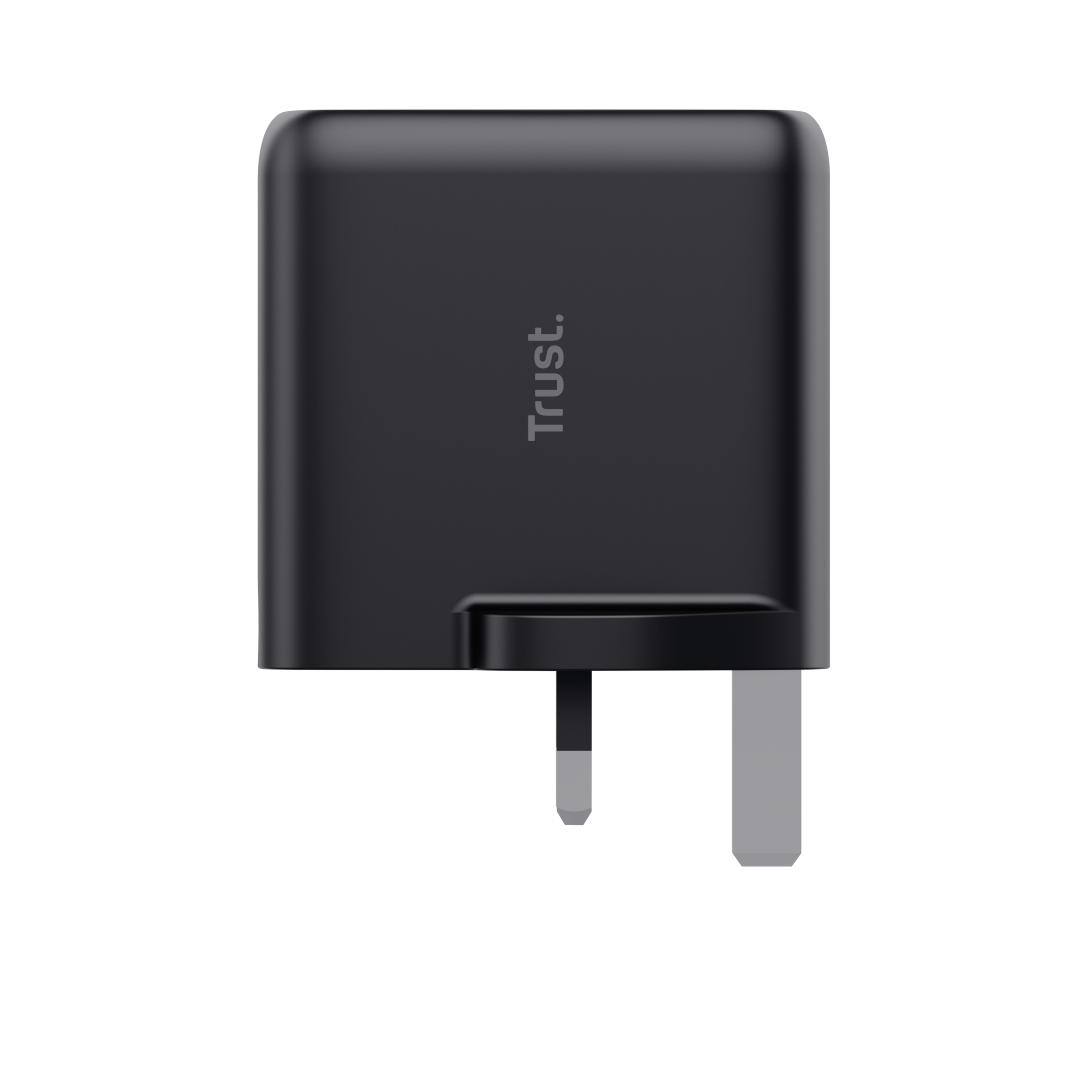 Zwarte USB-oplader met Britse stekker. De merknaam Trust staat op het vooroppervlak gedrukt.