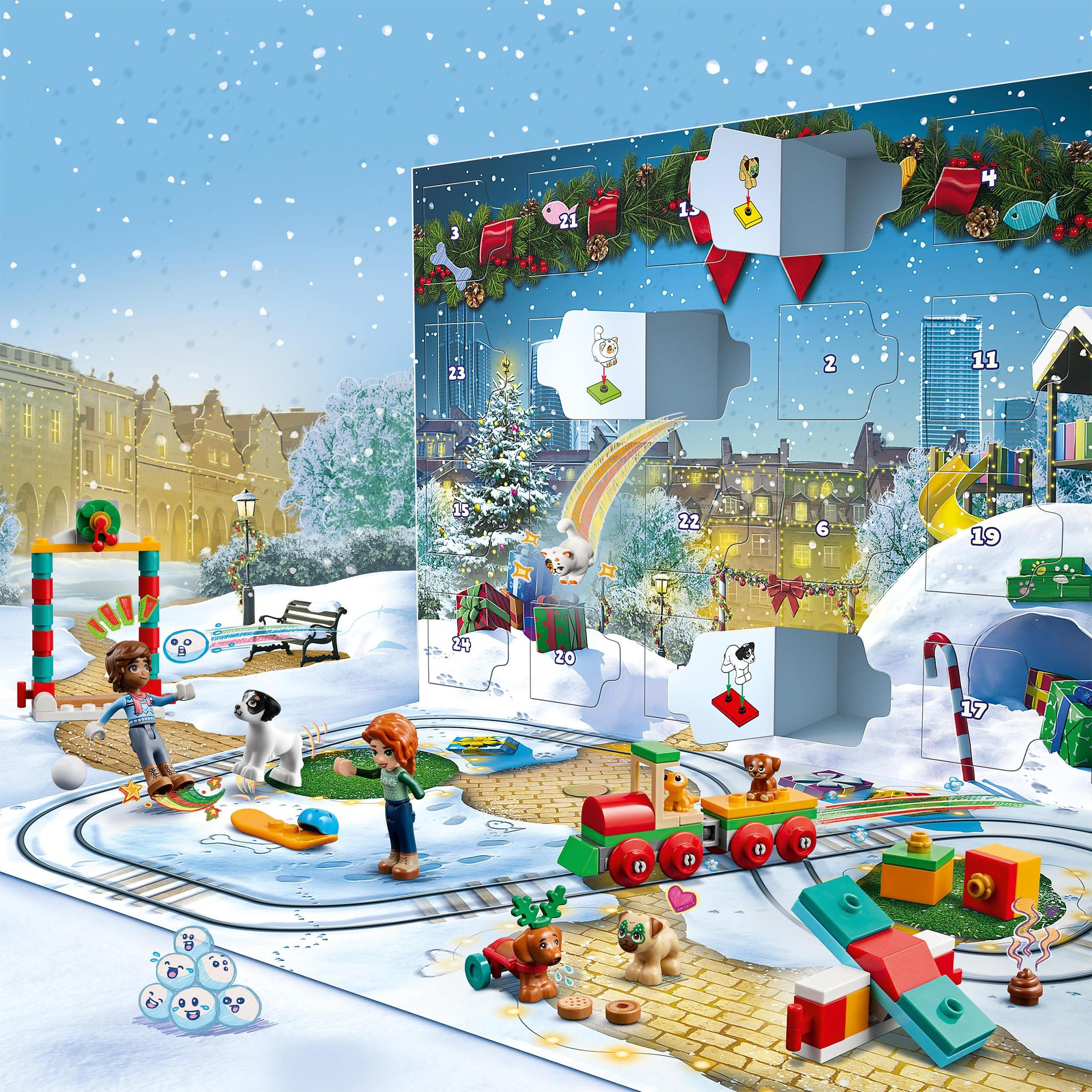 Een Lego Friends adventskalender scene. Figuren op een spoor met een trein. Sneeuw en een kerstboom zijn aanwezig.