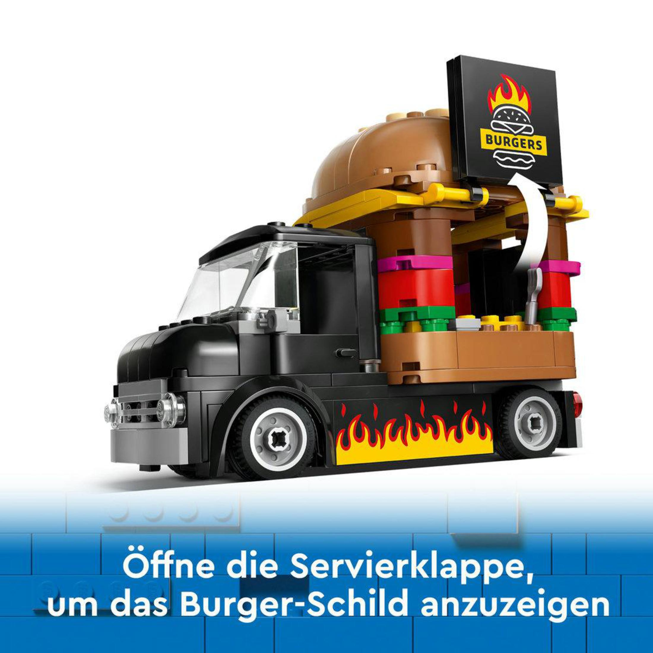 Un camión de comida negro con un letrero de hamburguesa y un diseño de semirremolque. El texto está en alemán.
