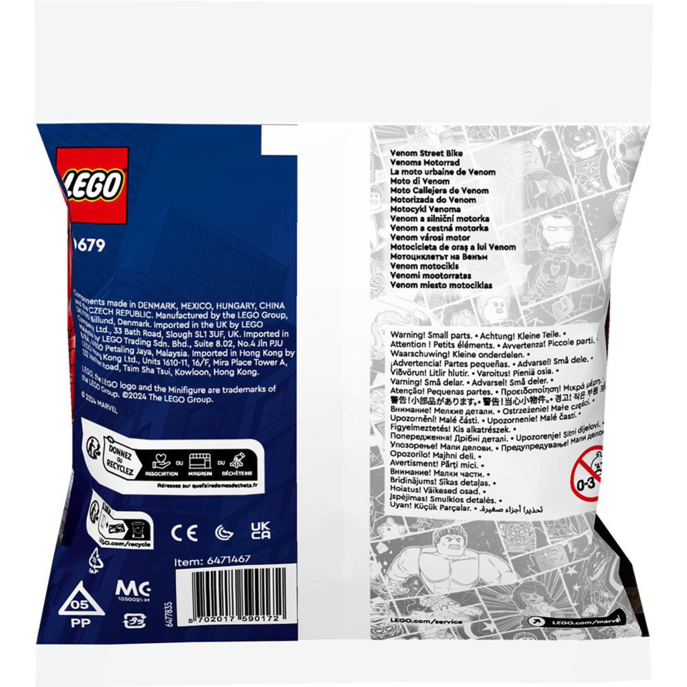 Lego instructies en onderdelen. Tekst in meerdere talen, recycling symbolen.