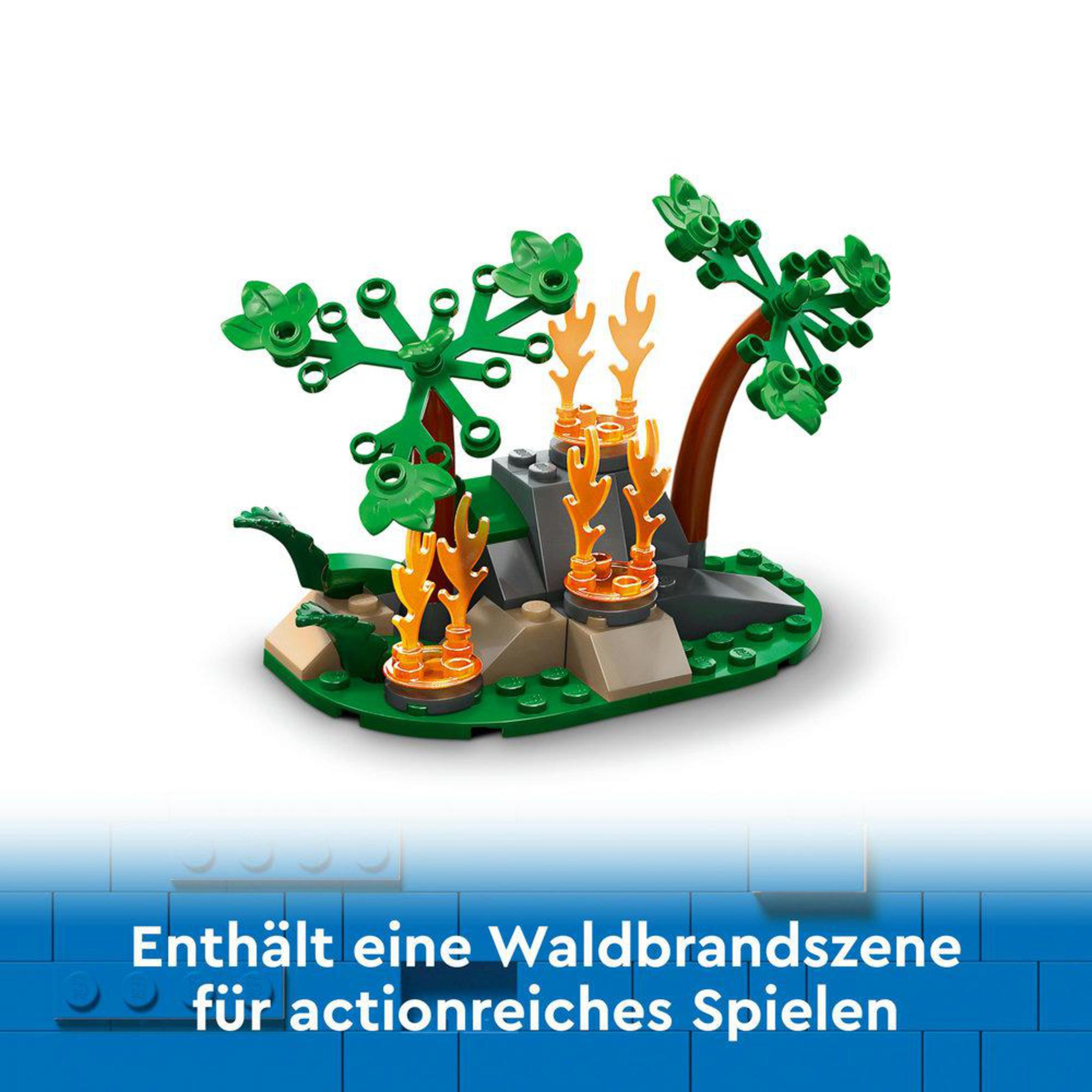 Modelo LEGO de una escena de incendio forestal. Base verde con árboles y elementos de llama naranja.