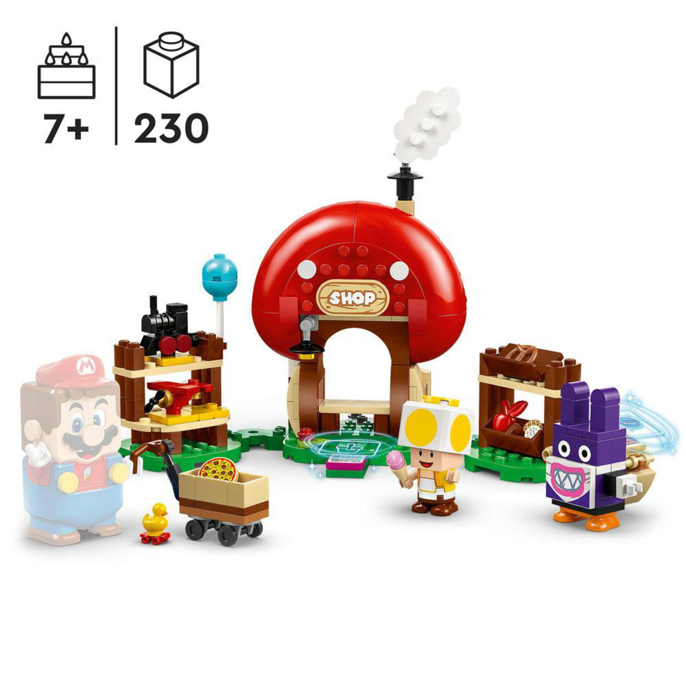 Set Lego Super Mario con Mario, Toad e un nemico viola vicino a un negozio e un treno.