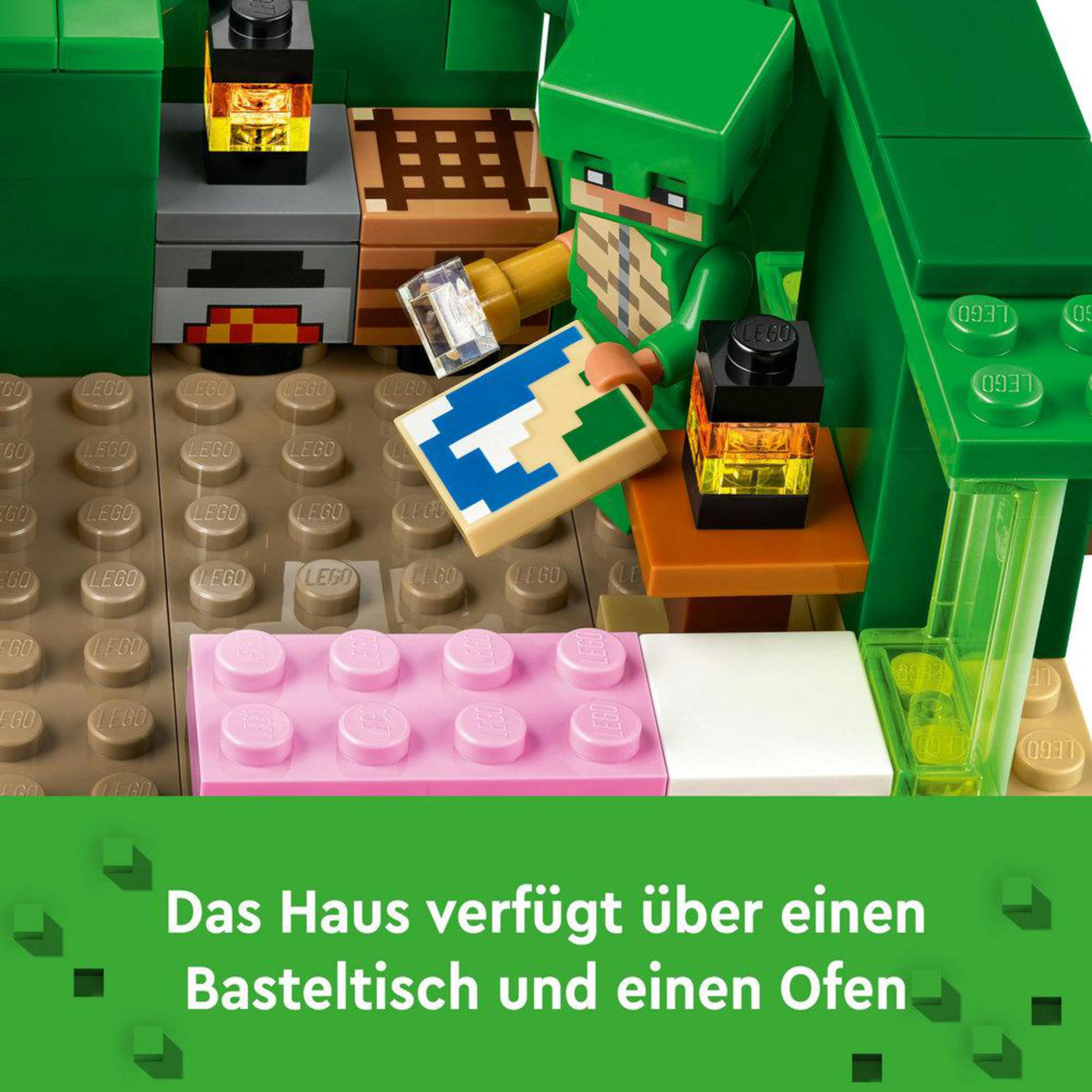 Lego Minecraft set met een groen personage, een crafting table en een oven.