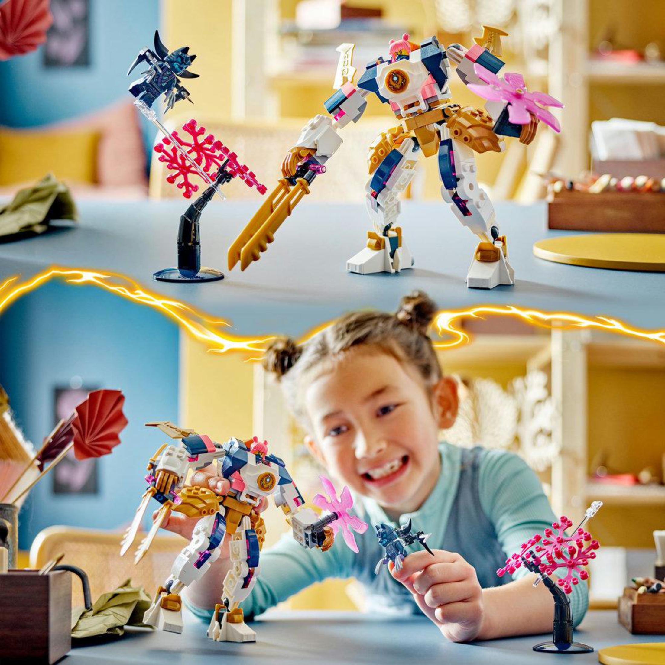 Zwei Lego-Roboter und ein Mädchen, das mit ihnen spielt. Ein Roboter hält ein Schwert.