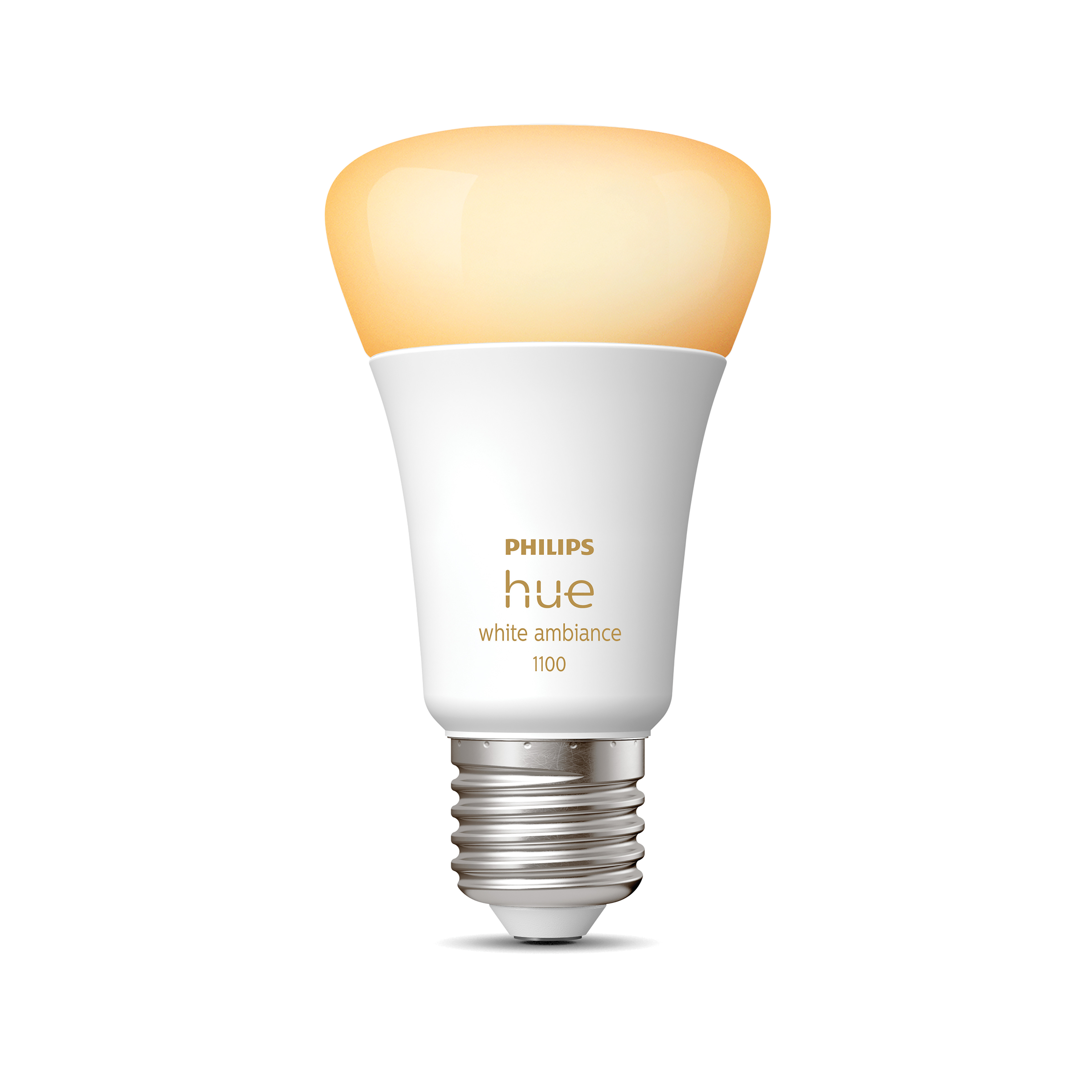 Biała żarówka Philips Hue. To żarówka. Żarówka ma żółto-pomarańczową poświatę.