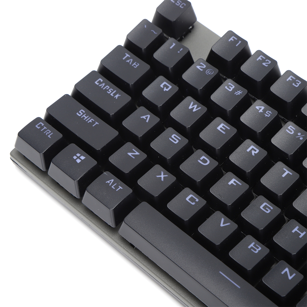 Nahaufnahme einer schwarzen Tastatur mit grauen Tasten.