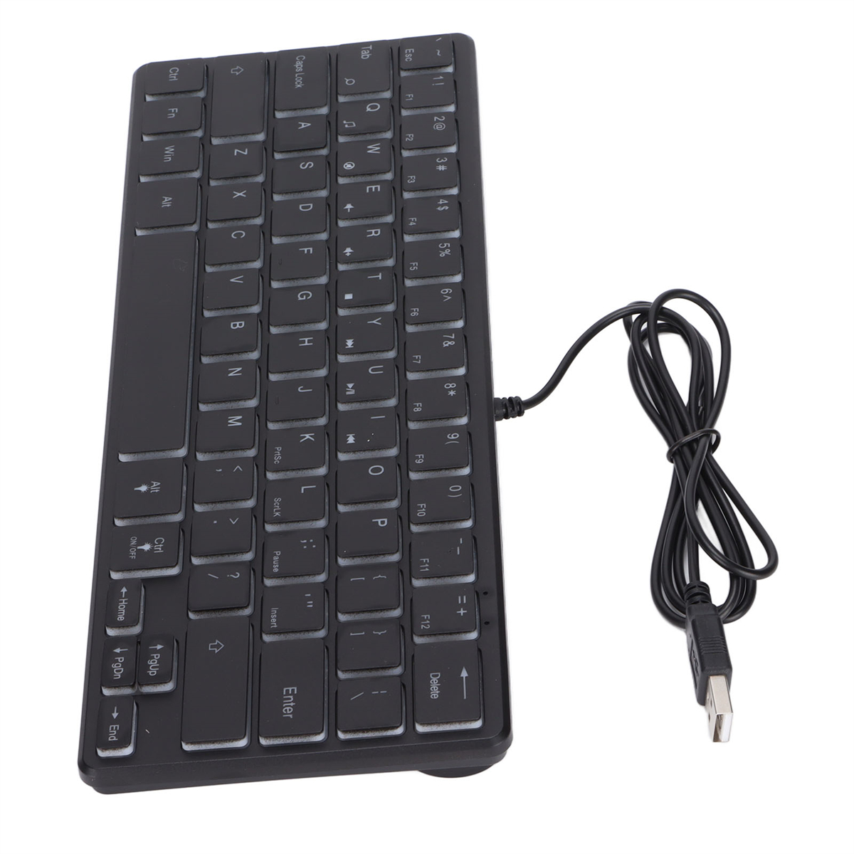 Eine schwarze, kleine Tastatur mit weißen Tasten und einem USB-Kabel.