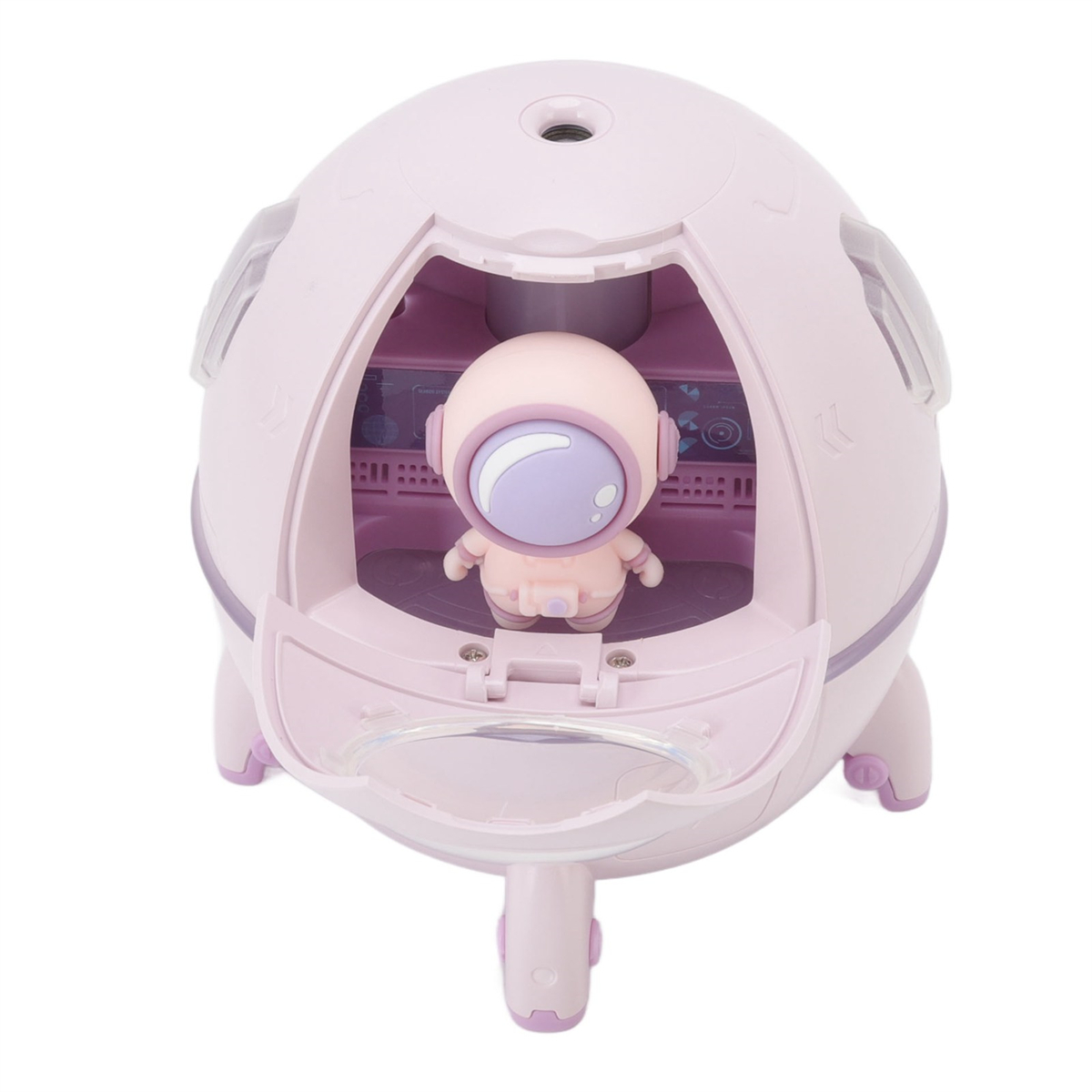 Eine rosa Astronautenfigur in einem rosa raumschiffartigen Luftbefeuchter. Das Raumschiff hat offene Türen.