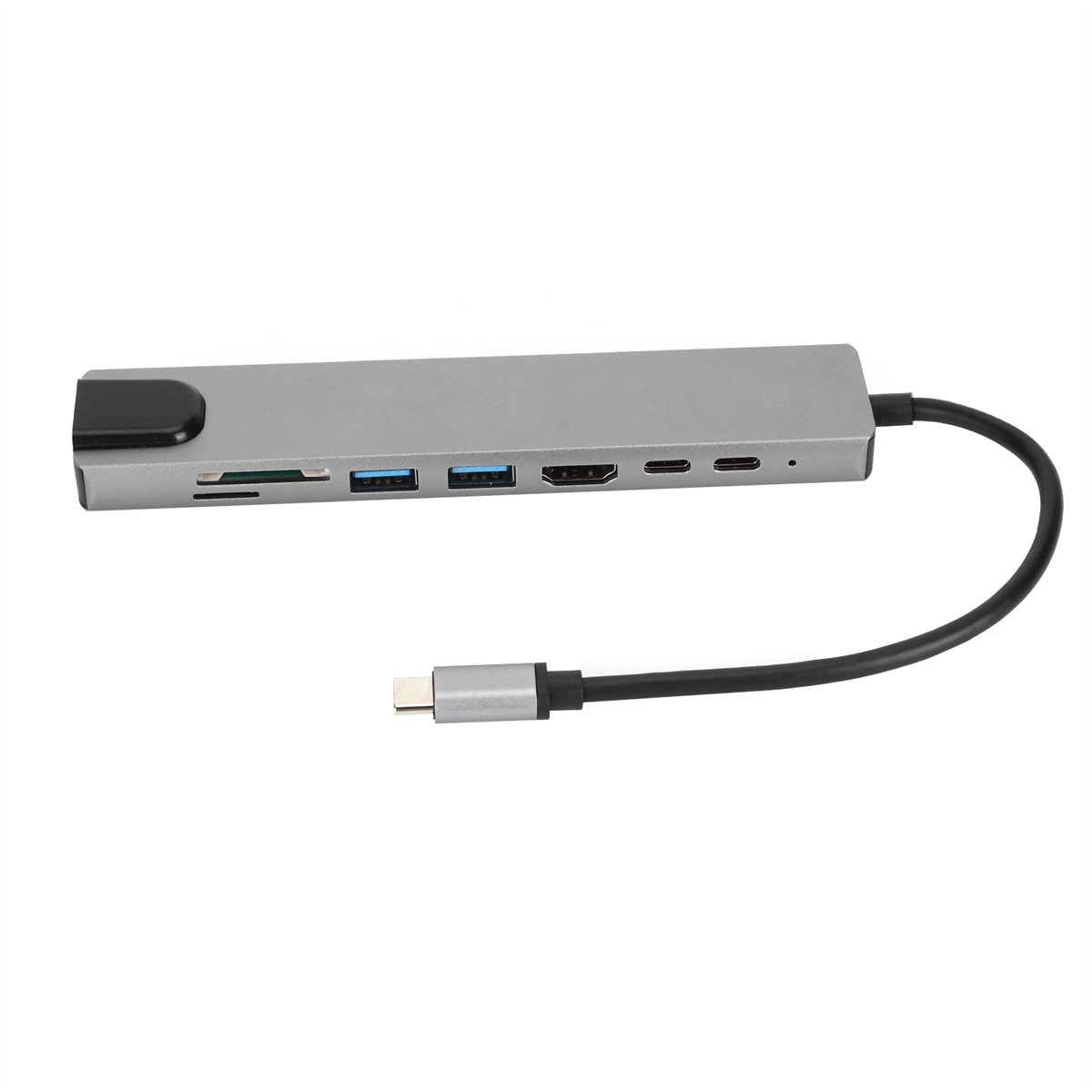 Ein grauer USB-Hub mit mehreren Anschlüssen und einem schwarzen Kabel mit USB-C-Anschluss.