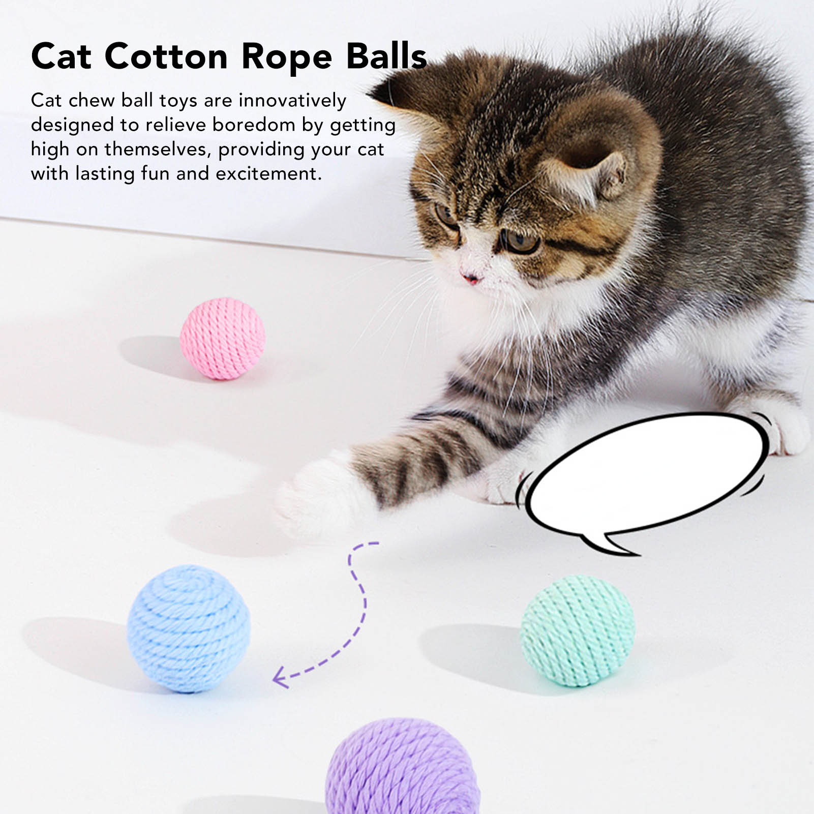 Katze schlägt nach bunten Wollkugeln auf weißer Oberfläche mit Sprechblase.