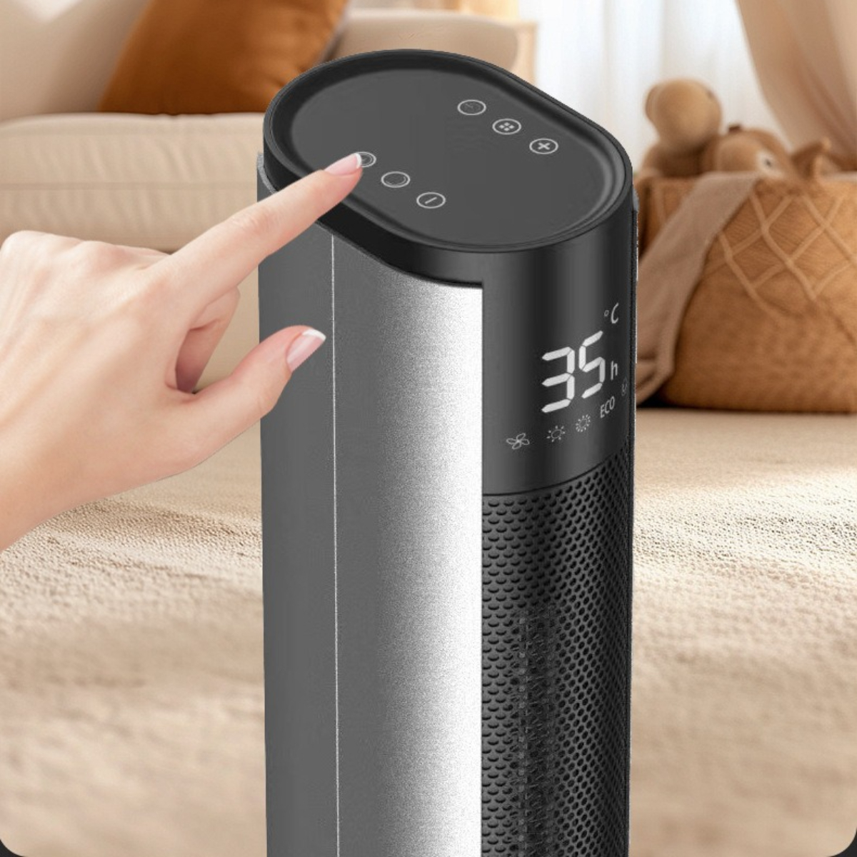 Der Finger einer Person berührt eine digitale Anzeige auf einer schwarz-silbernen Heizung. Ein Bett und ein Korb sind im Hintergrund.