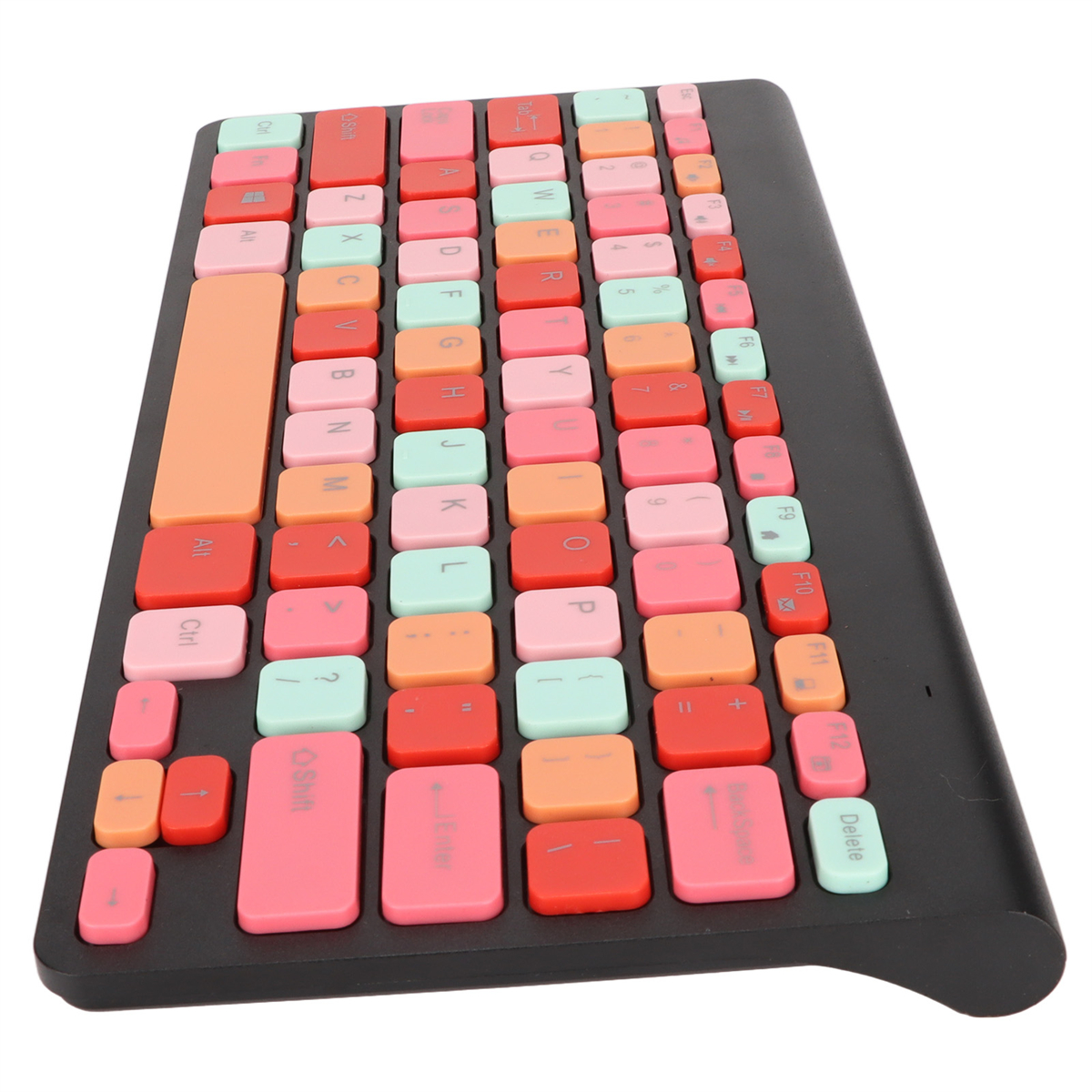 Eine farbenfrohe Tastatur mit rosa, roten, orangen und mintfarbenen Tasten. Die Tastatur befindet sich auf weißem Hintergrund.