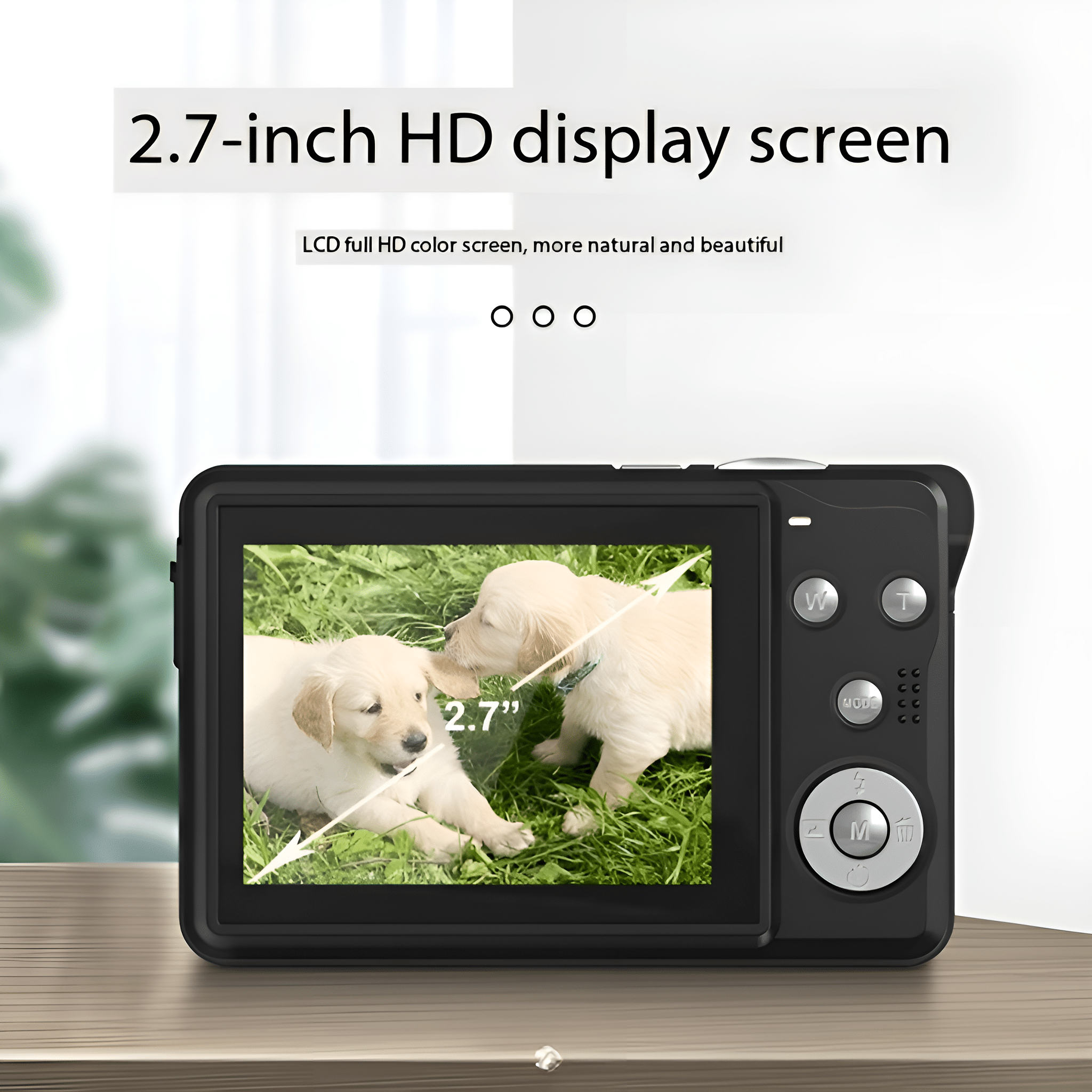 Schwarze Digitalkamera mit 2,7-Zoll-HD-Display, das zwei Welpen zeigt.