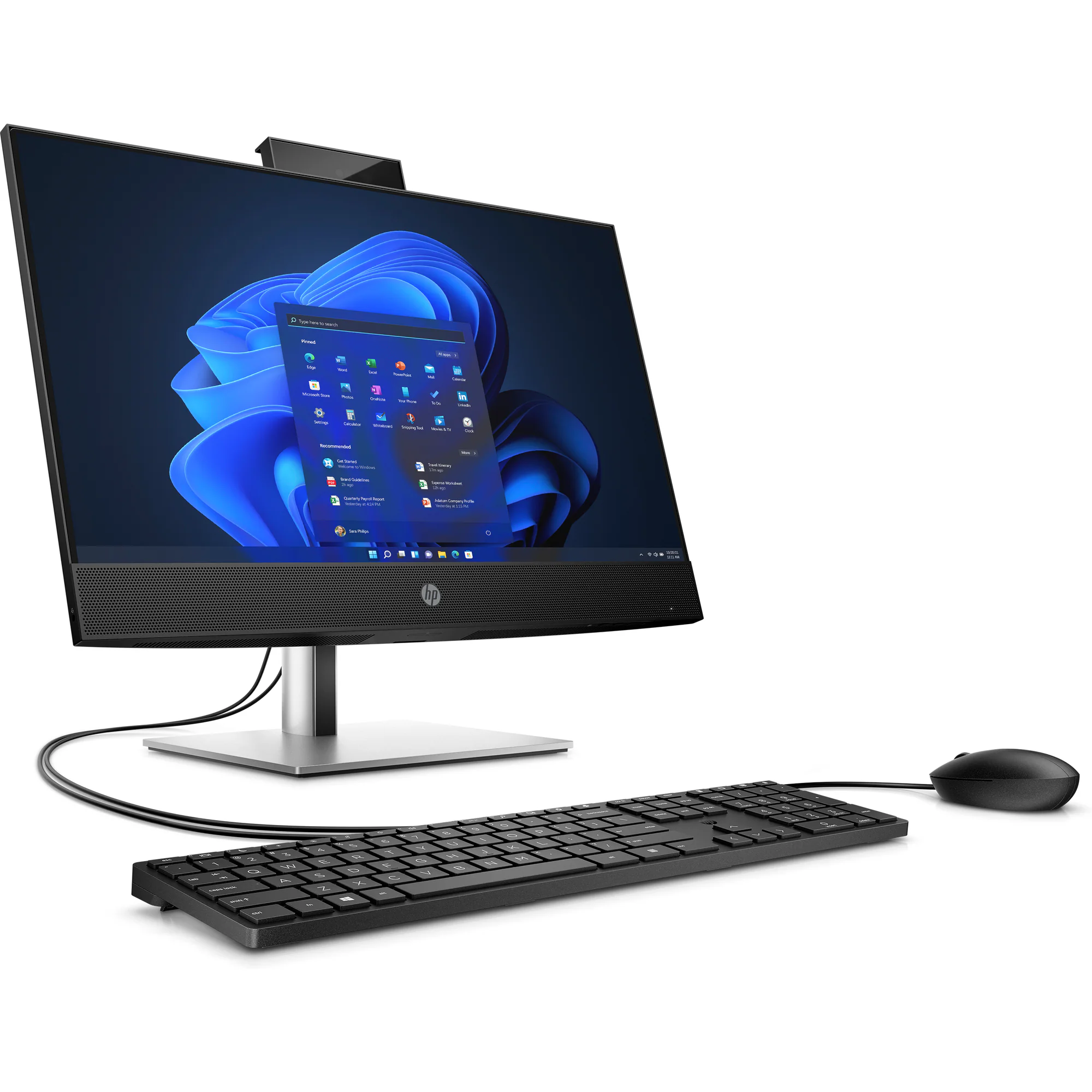 Un monitor, teclado y ratón negros sobre una superficie blanca.