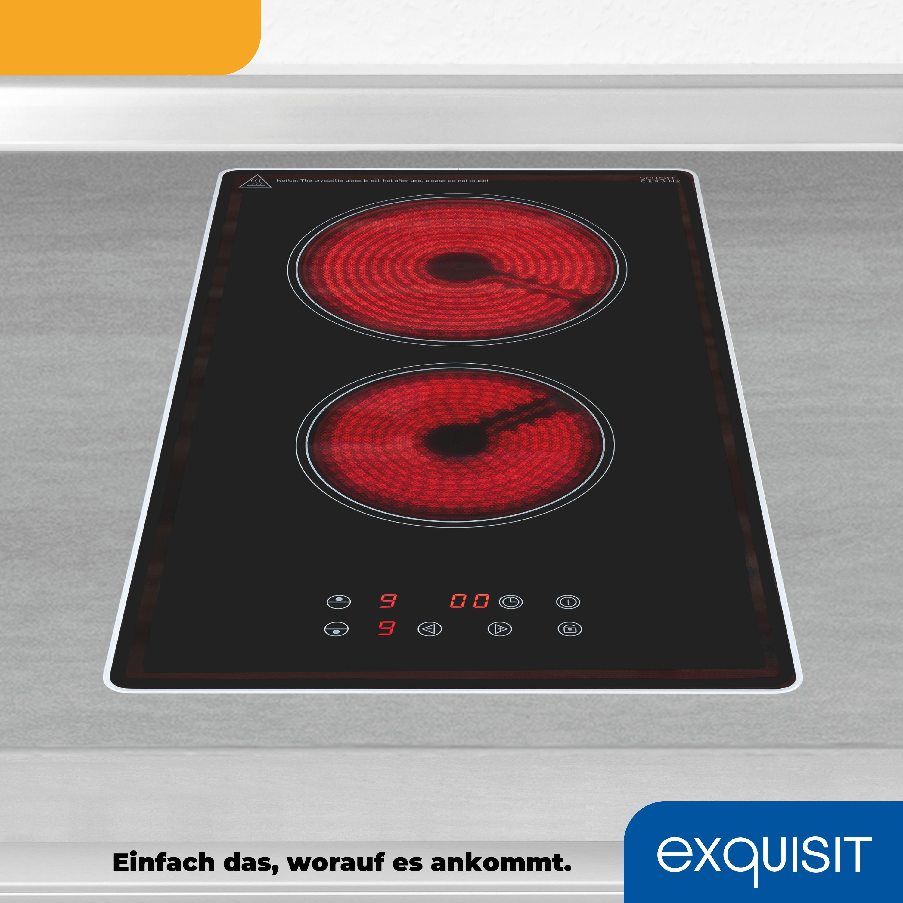 Schwarzes Induktionskochfeld mit roten Brennern, Digitalanzeige und Sicherheitshinweisen.