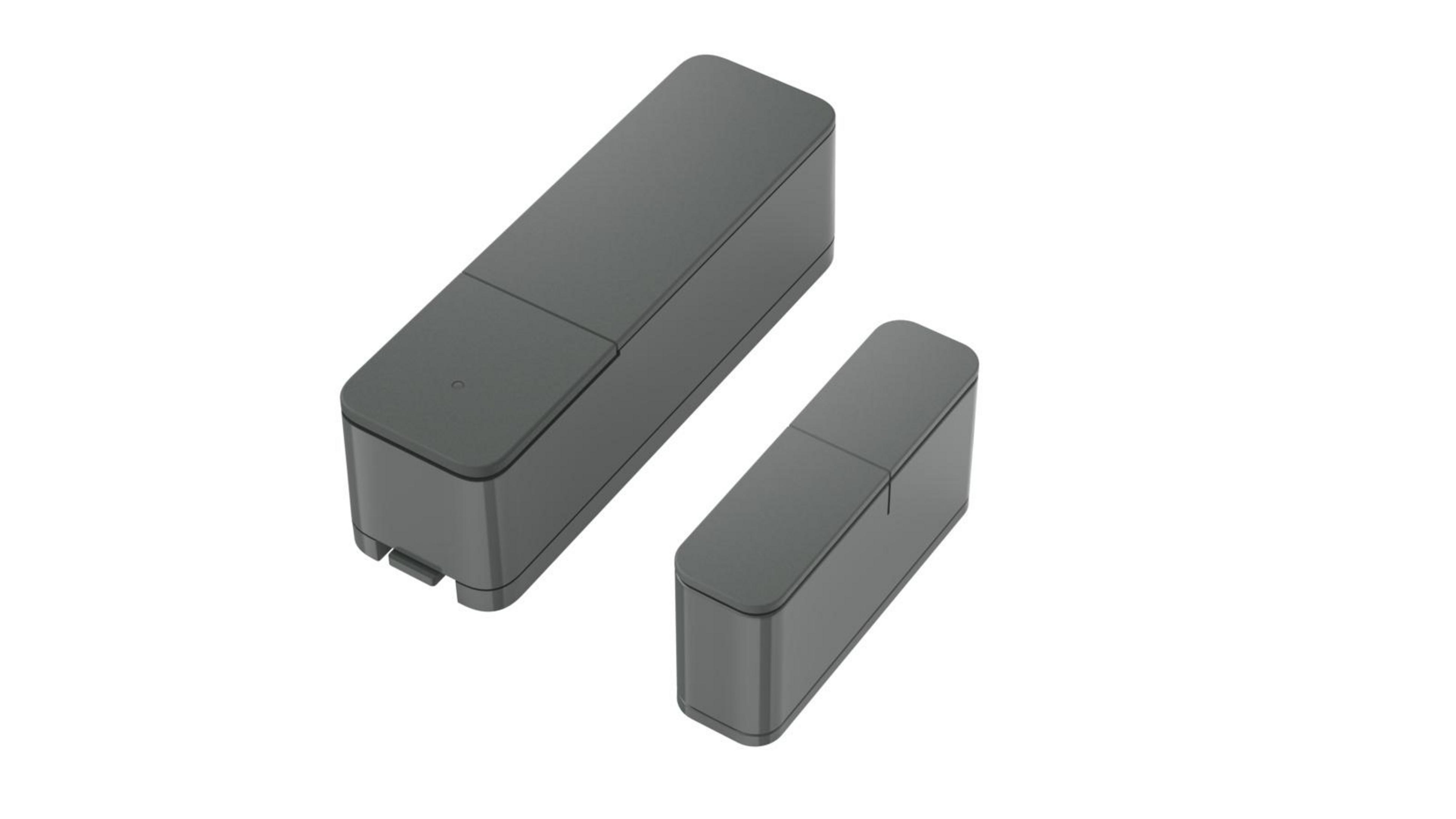 Dwa szare prostokątne pudełka, jedno większe od drugiego, na białym tle.
