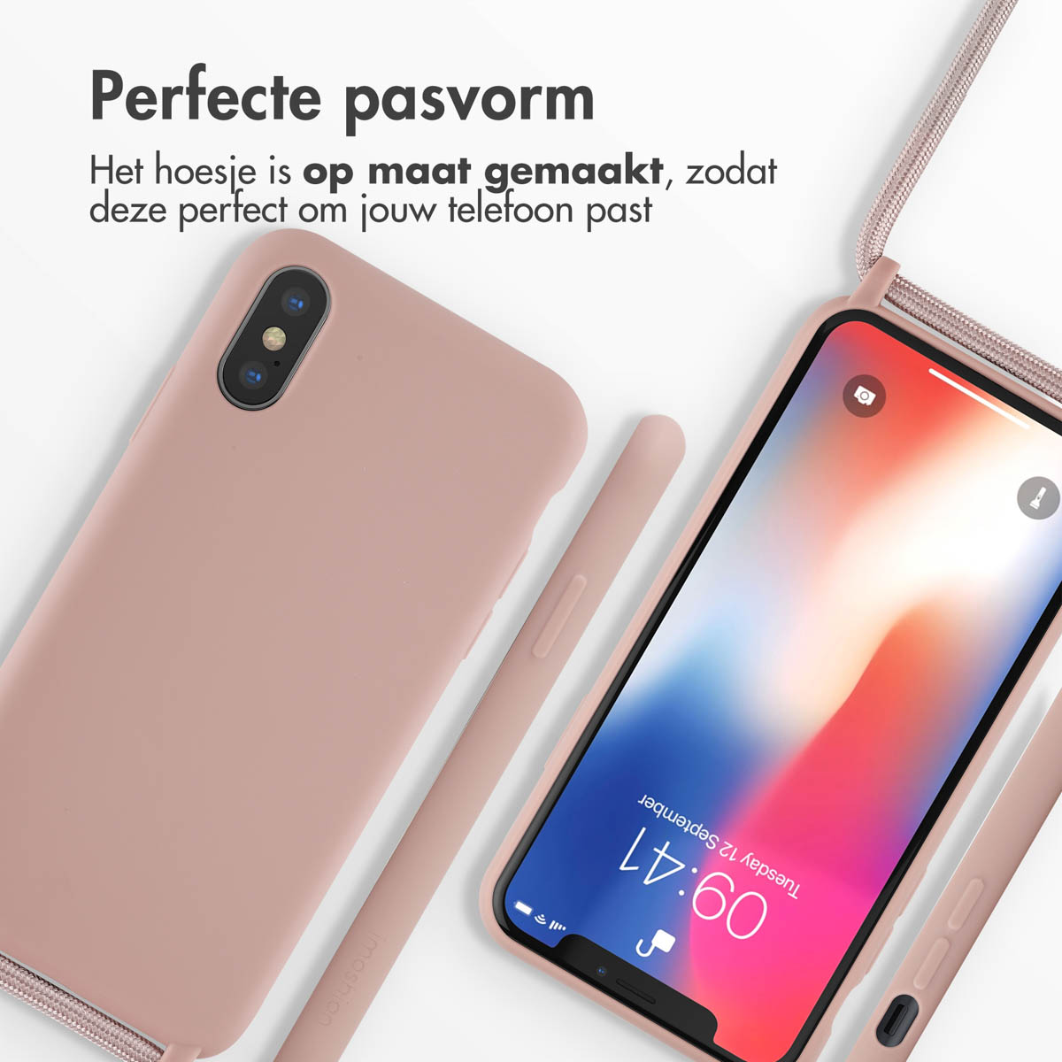 Una custodia per telefono rosa con cordino, accanto a un telefono che mostra uno sfondo colorato con l'ora 4:40.
