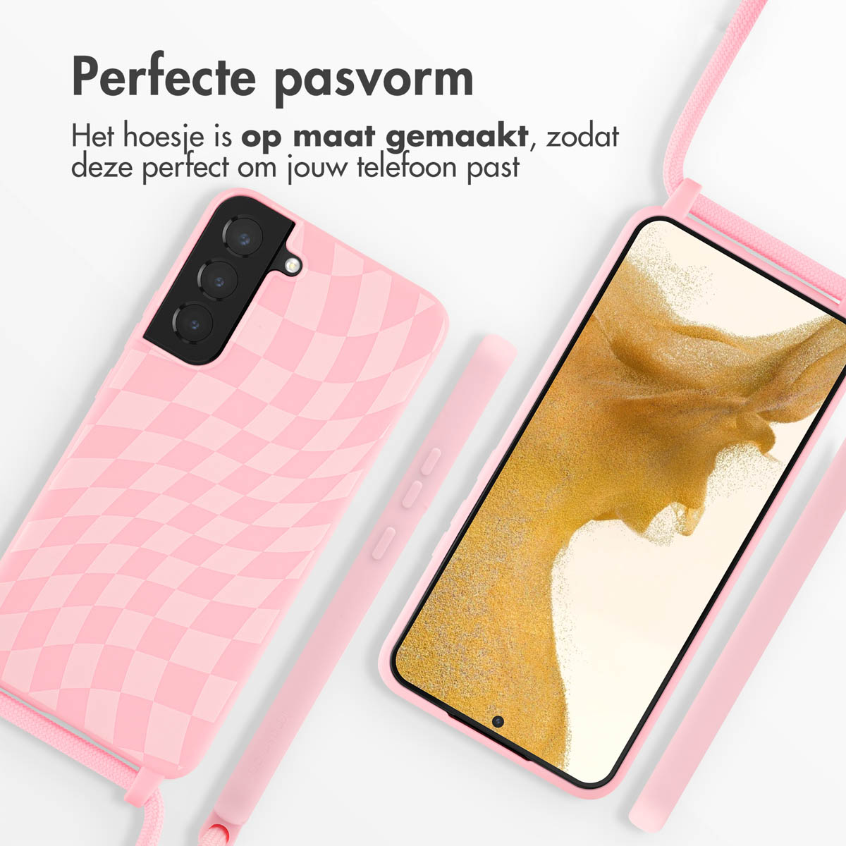 Une coque de téléphone rose avec un motif à carreaux et un cordon assorti, à côté d'un téléphone avec un fond jaune.