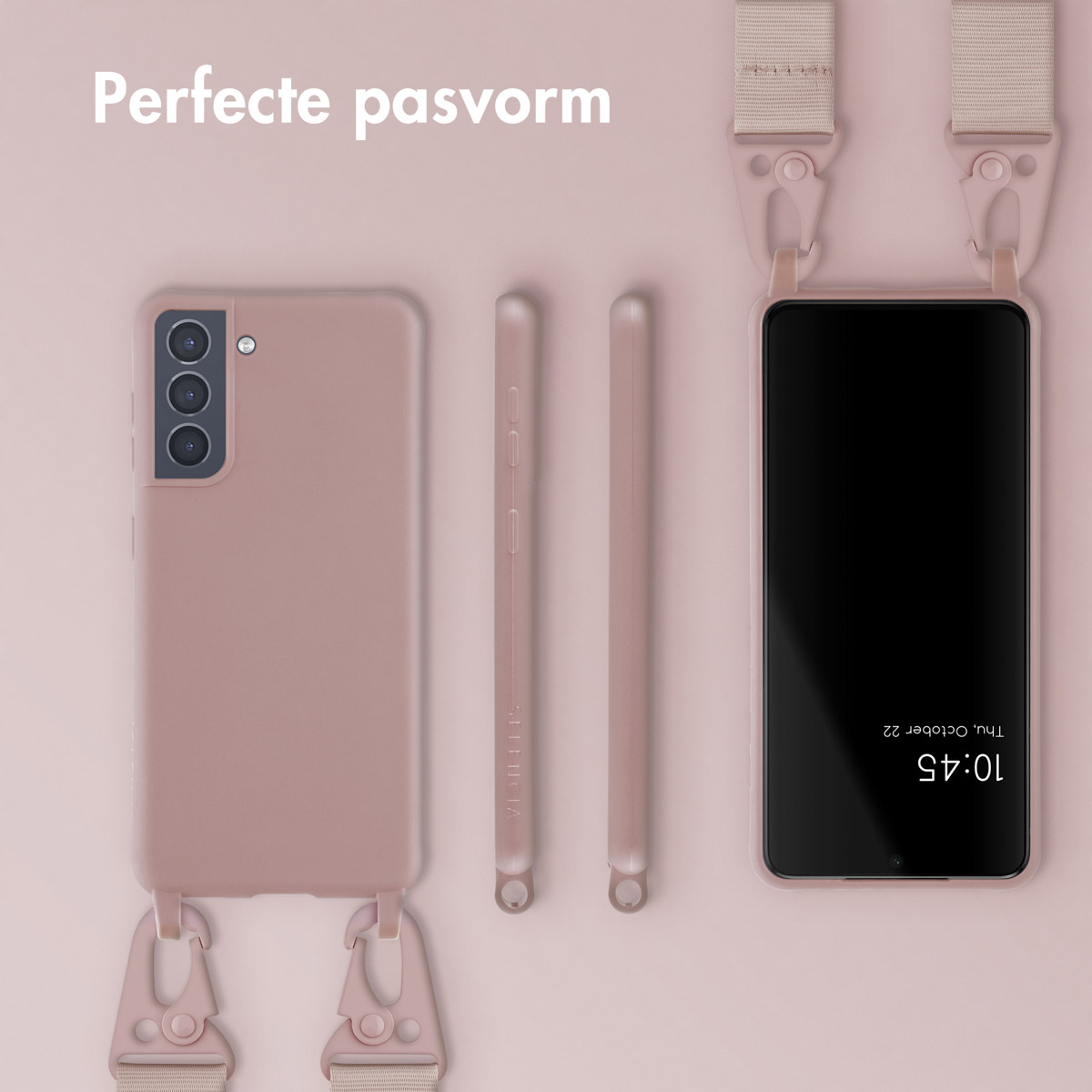 Roze telefoonhoes, telefoon en bandjes. Telefoon toont tijd. Achtergrond is roze.