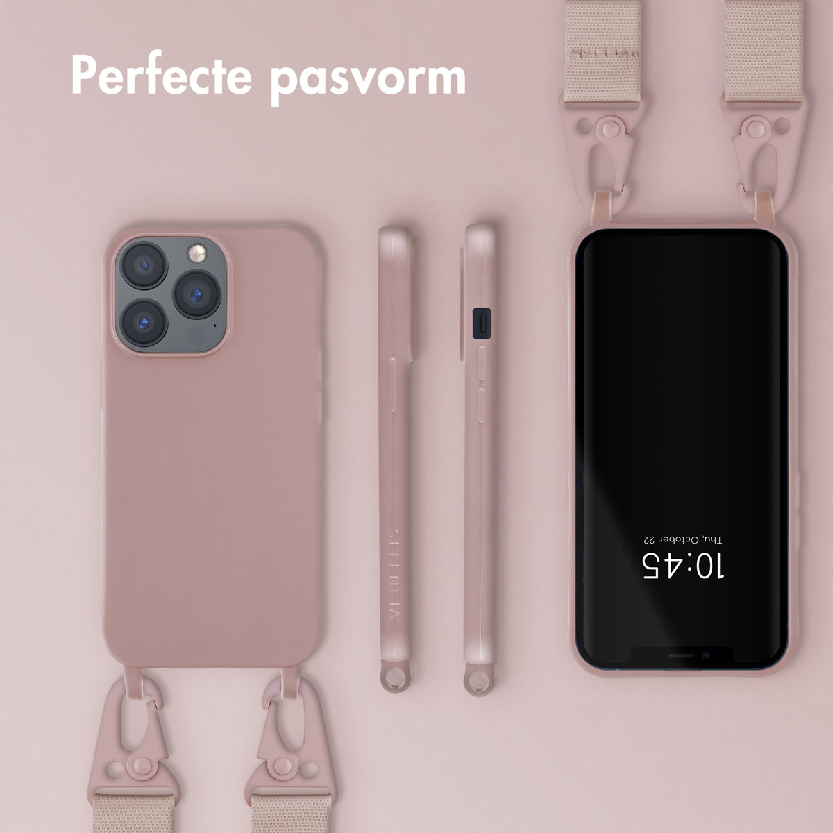 Roze telefoonhoes met band en telefoon. Accessoireset, op roze achtergrond.
