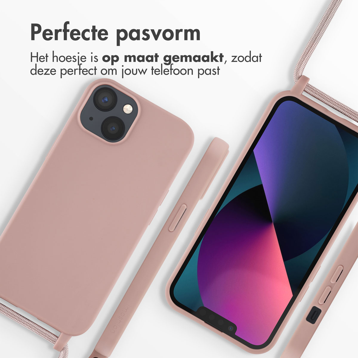 Coque de téléphone rose avec un téléphone, une coque et une sangle. Ensemble sur une surface blanche.