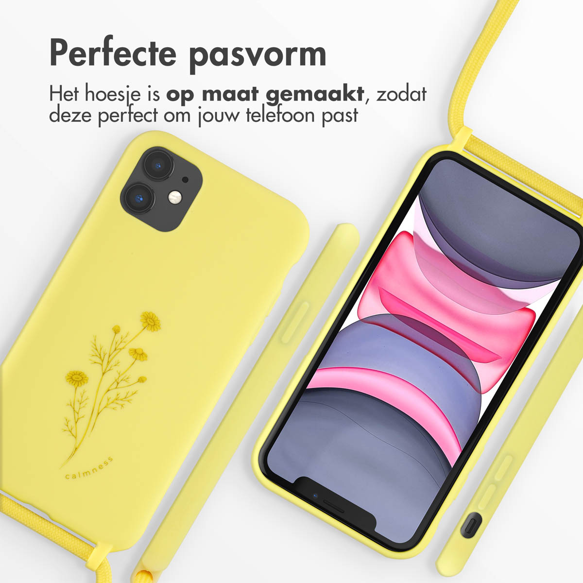 Gelbe Handyhülle mit Blumendesign neben einem Telefon mit hellem Bildschirm, mit Riemen.